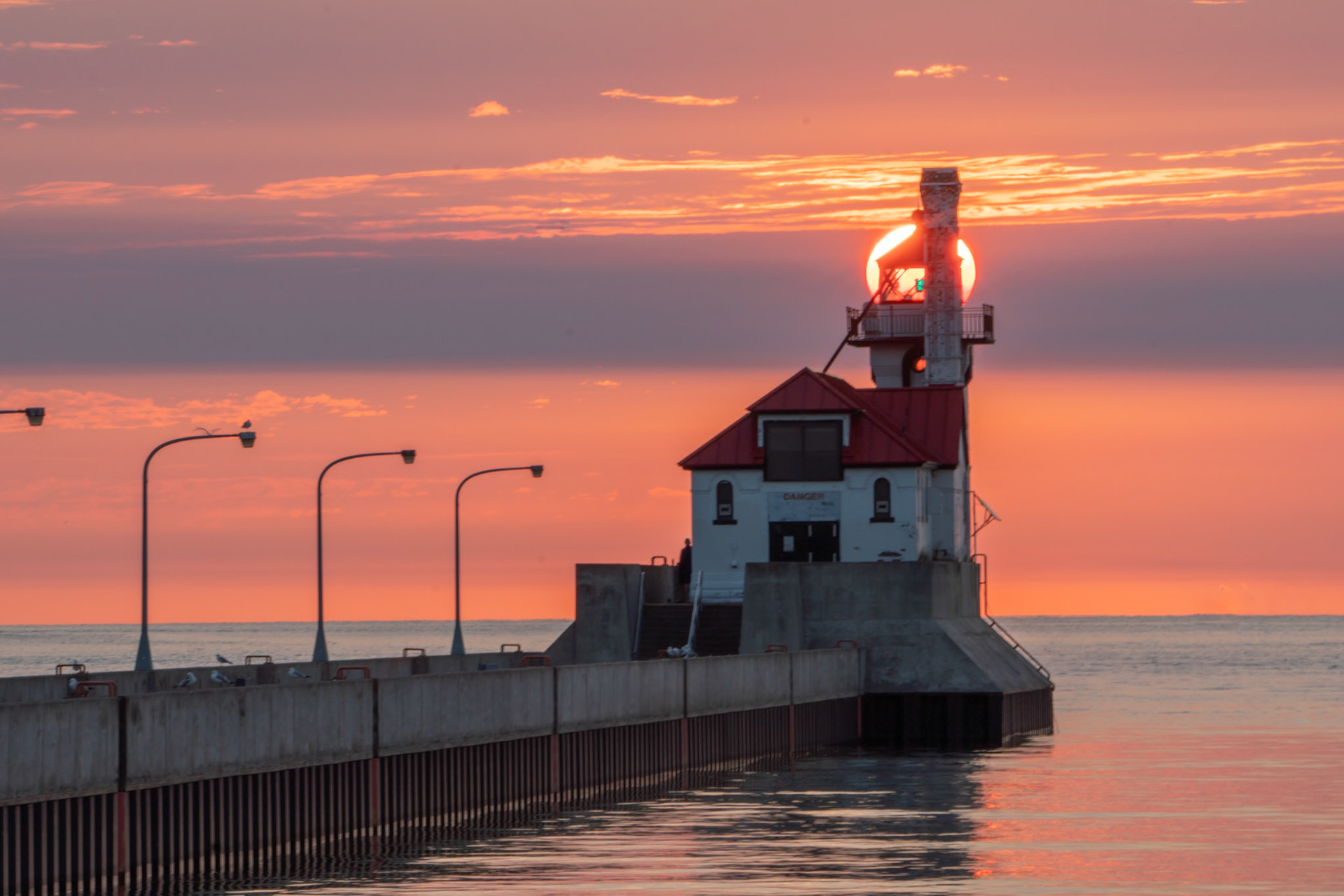 July 23 - Dawn's Early Light—Summer sunrises over Lake Superior occur in the early hours of 5 AM. A walk in the cool morning air of the lakeshore to take in a "Superior Sunrise" makes the loss of sleep a small price for the beauty to behold.The combination of light, colors, clouds, and water calms the soul and puts things into perspective, as creation always points to God as our creator, the artist behind the scenes.Arise, shine; for your light has come, And the glory of the LORD has risen upon you. Isaiah 60:1