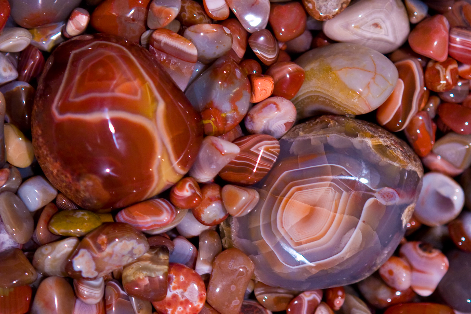 The Lake Superior Agate is Minnesota's State Gem. It is a type of agate stained by iron and found on the shores of Lake Superior. The gemstone comes in various sizes. The gas pockets in which the agates formed were primarily small, about the size of a pea. A few Lake Superior agates weigh more than 20 pounds, about the size of a bowling ball. Such giant agates are extremely rare, but no doubt others are yet to be discovered.