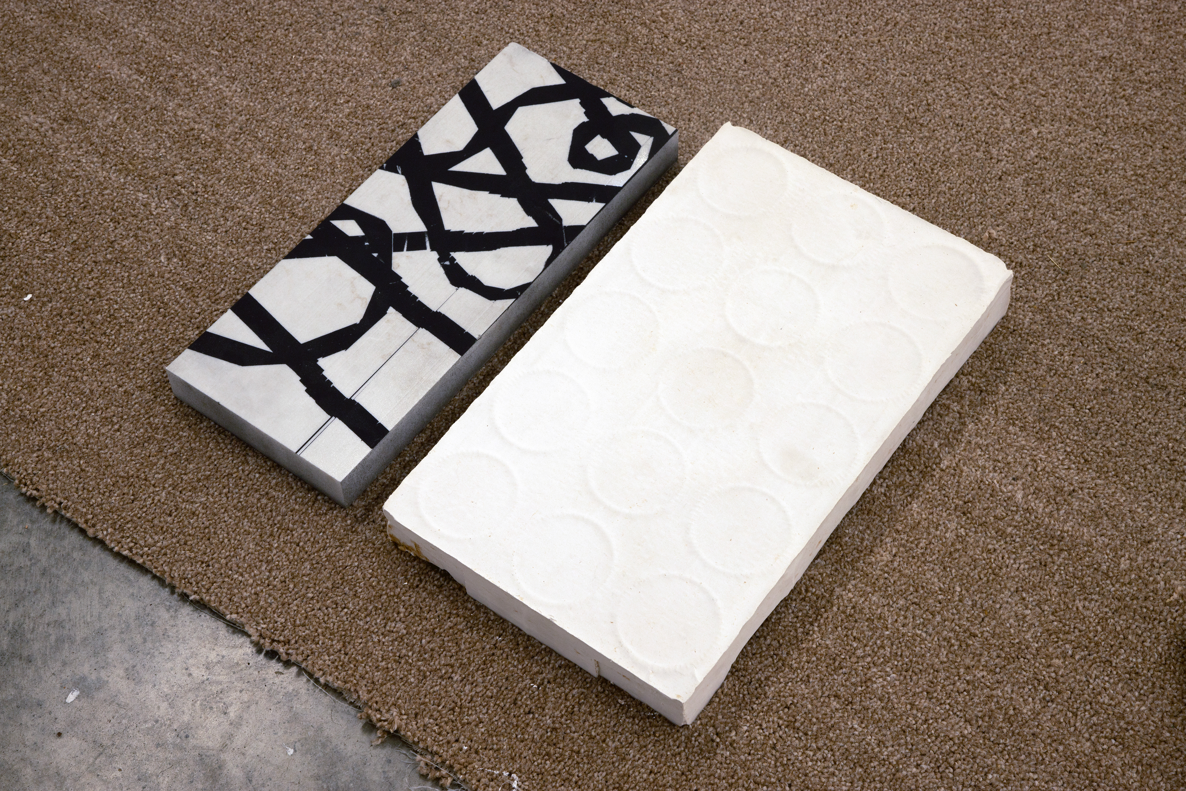 'Untitled' (2026) Marble, Spray Paint, Plaster.