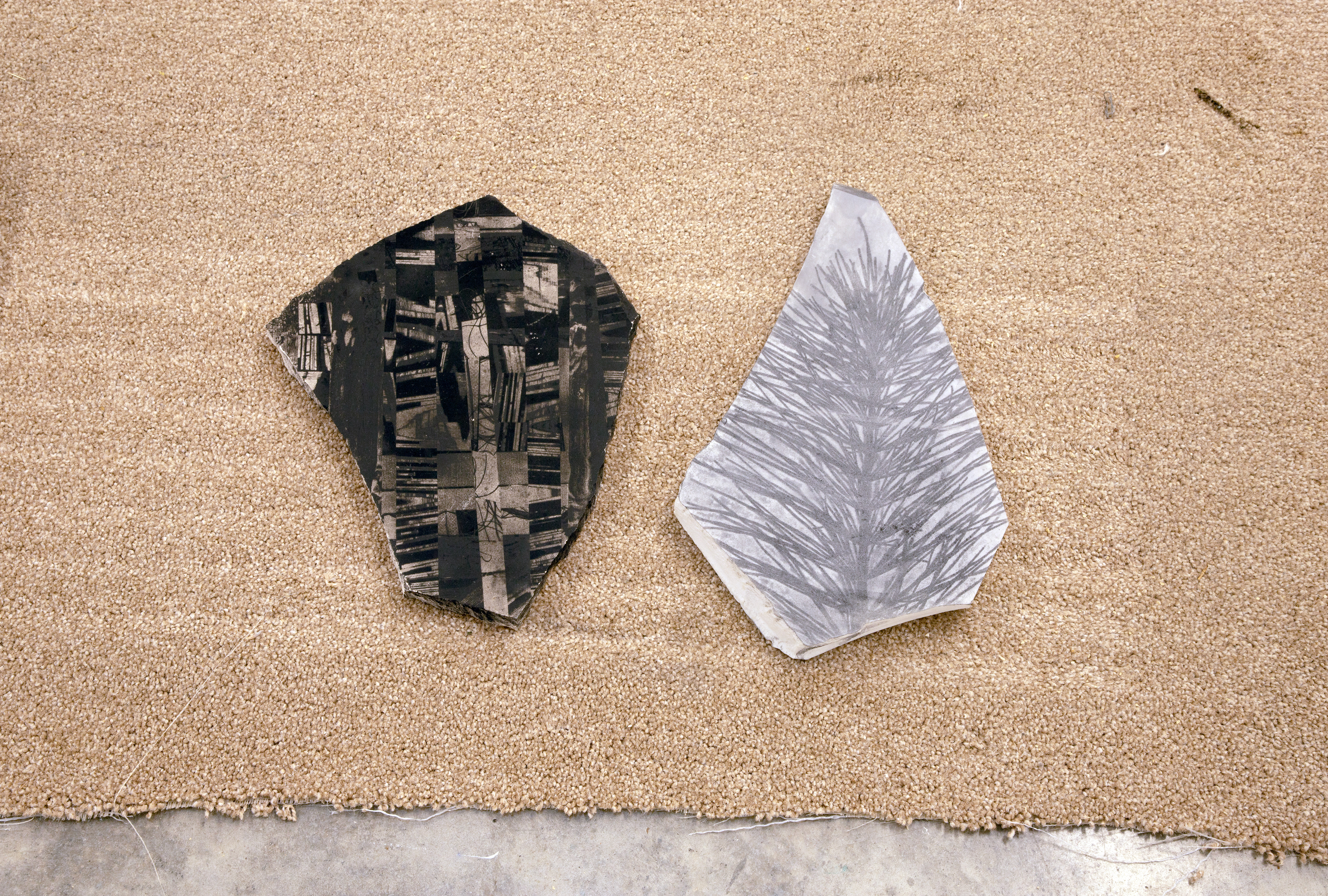 'Untitled' (2026)  Spray Paint, Rock, Graphite.