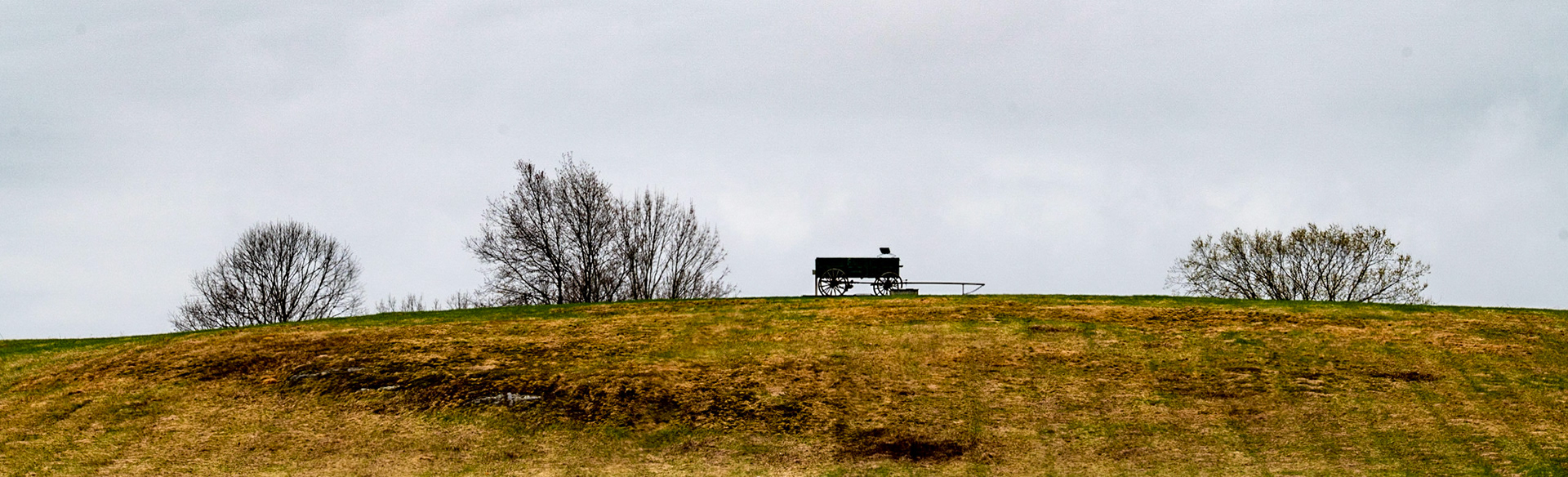 A lone wagon sits on the hill of Wagon Hill Farm in Portsmouth, NH