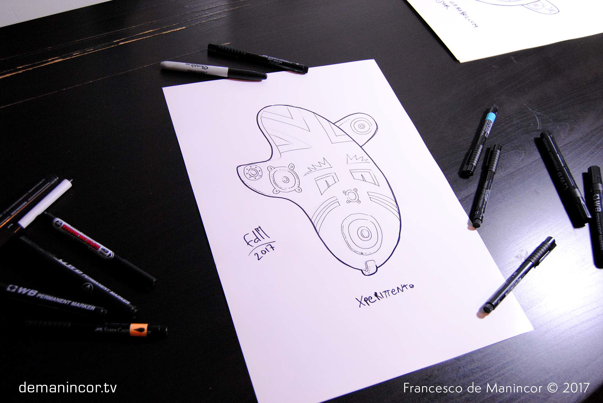 sketch of a mask with markers on paper