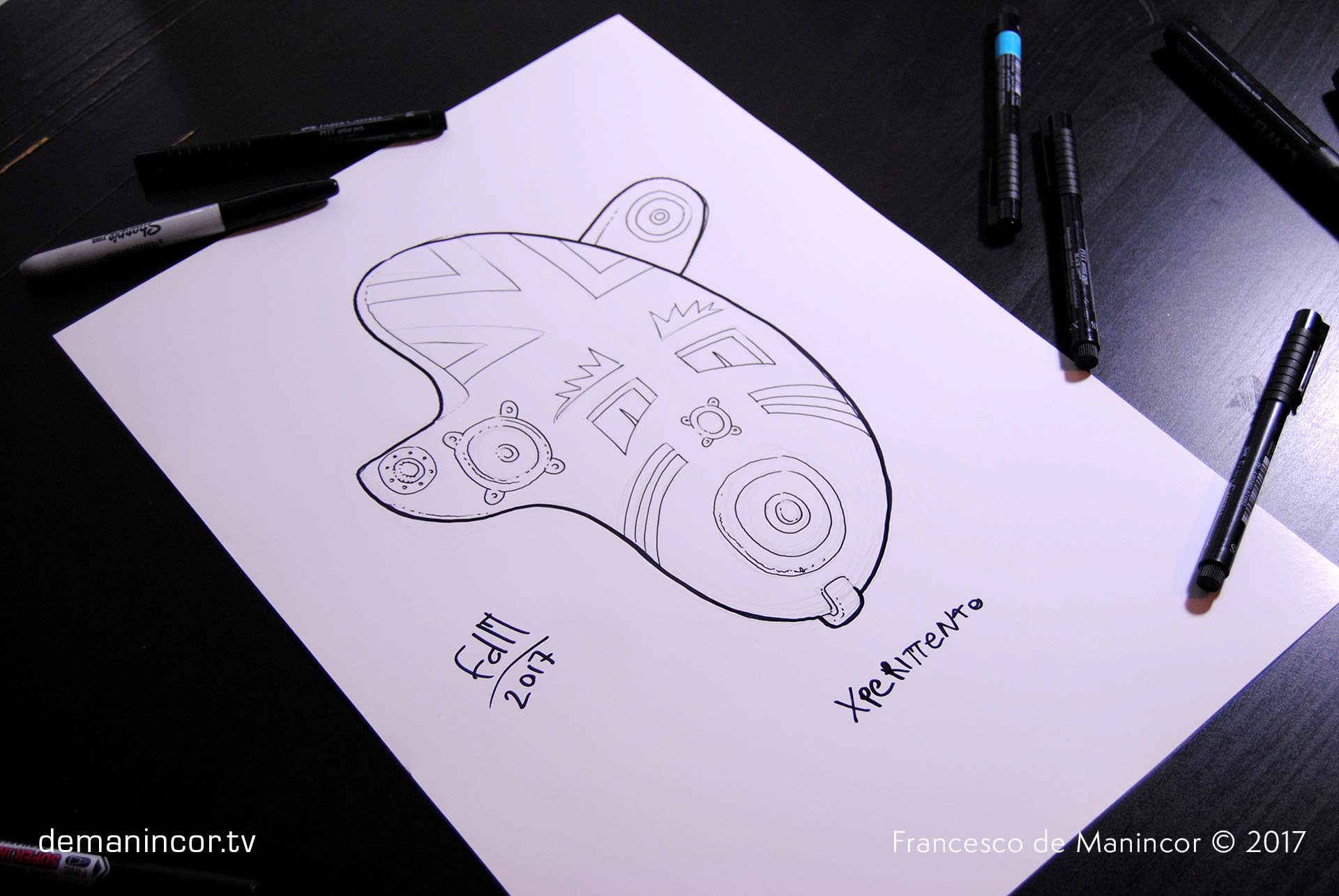 sketch of a mask with markers on paper