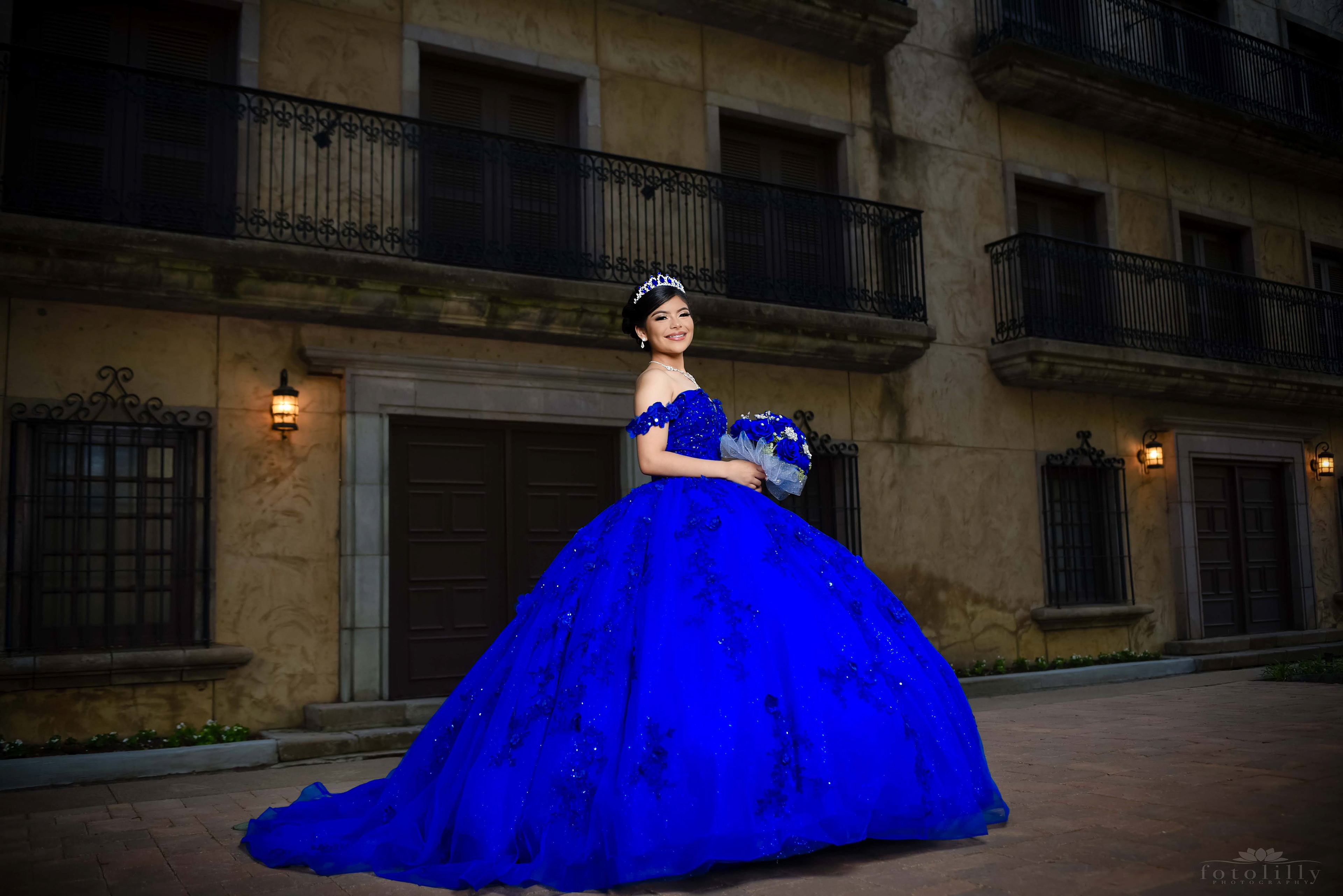 Quinceañera in a Stunning Blue Dress at a Photoshoot at the canals in Las Colinas