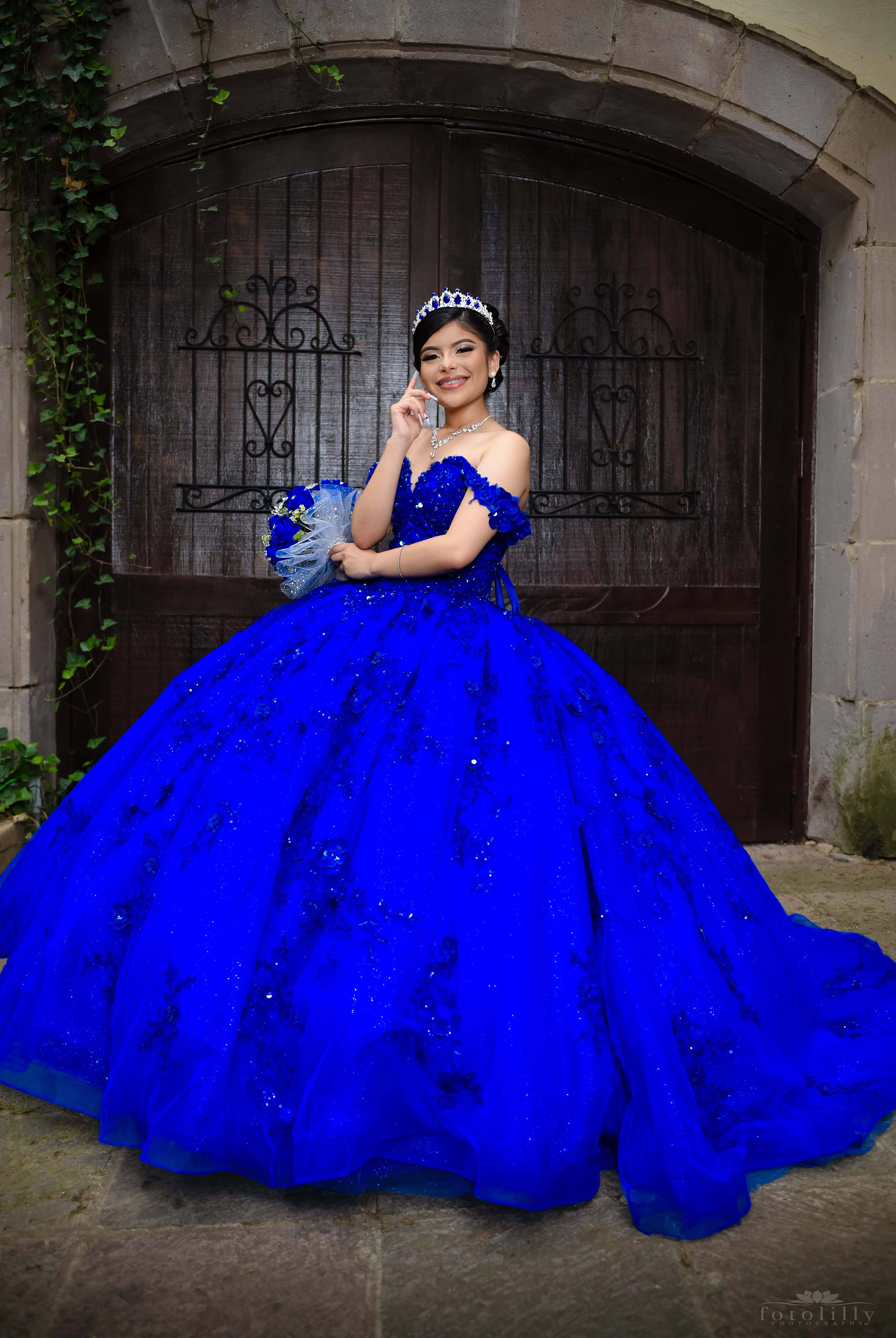 Quinceañera in a Stunning Blue Dress at a Photoshoot at the canals in Las Colinas