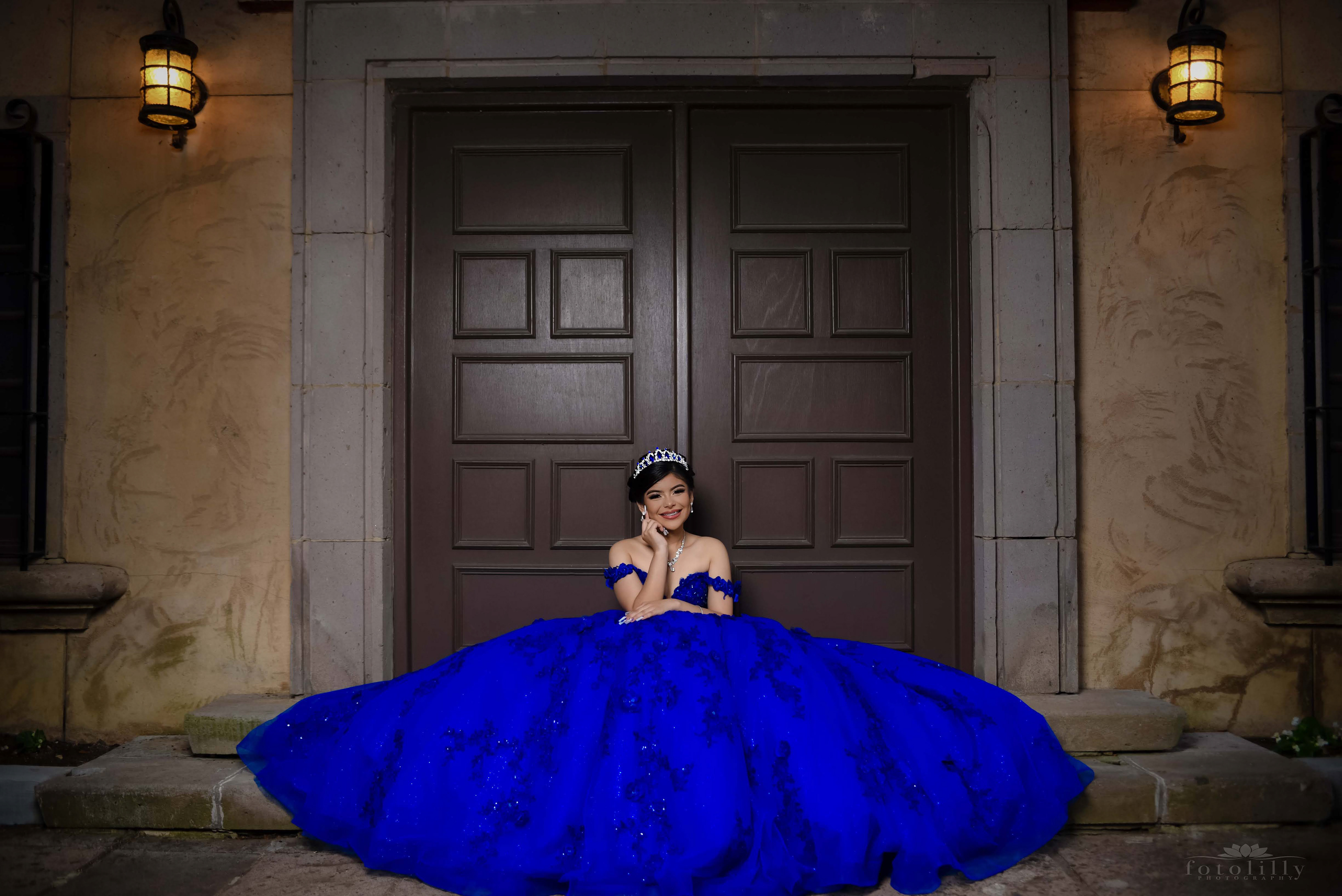 Quinceañera in a Stunning Blue Dress at a Photoshoot at the canals in Las Colinas
