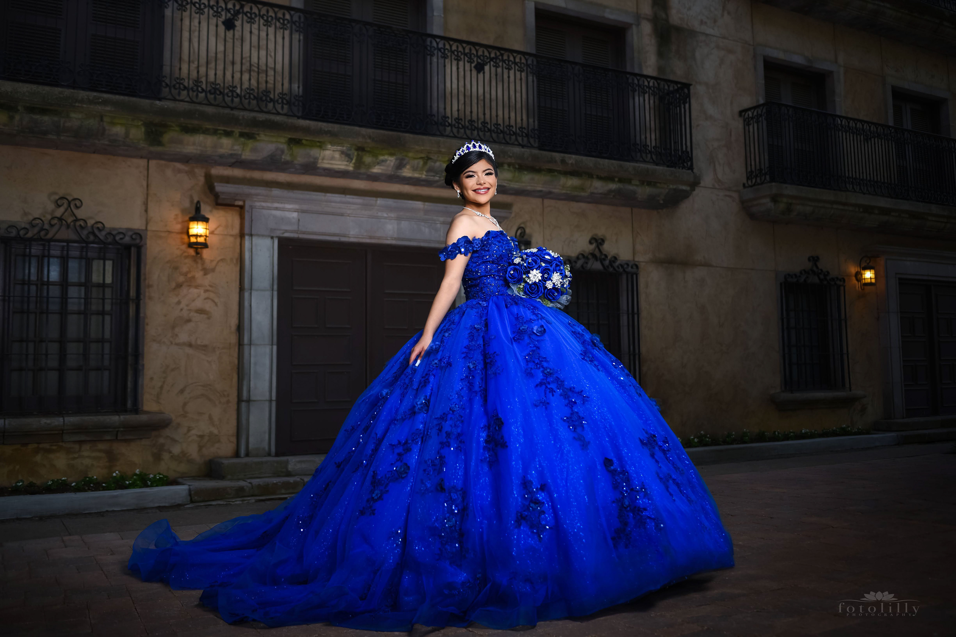 Quinceañera in a Stunning Blue Dress at a Photoshoot at the canals in Las Colinas