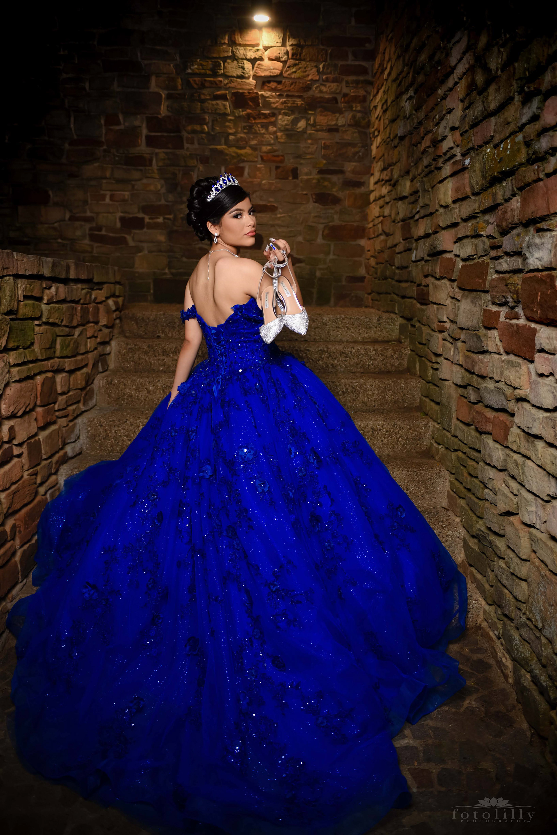 Quinceañera in a Stunning Blue Dress at a Photoshoot at the canals in Las Colinas