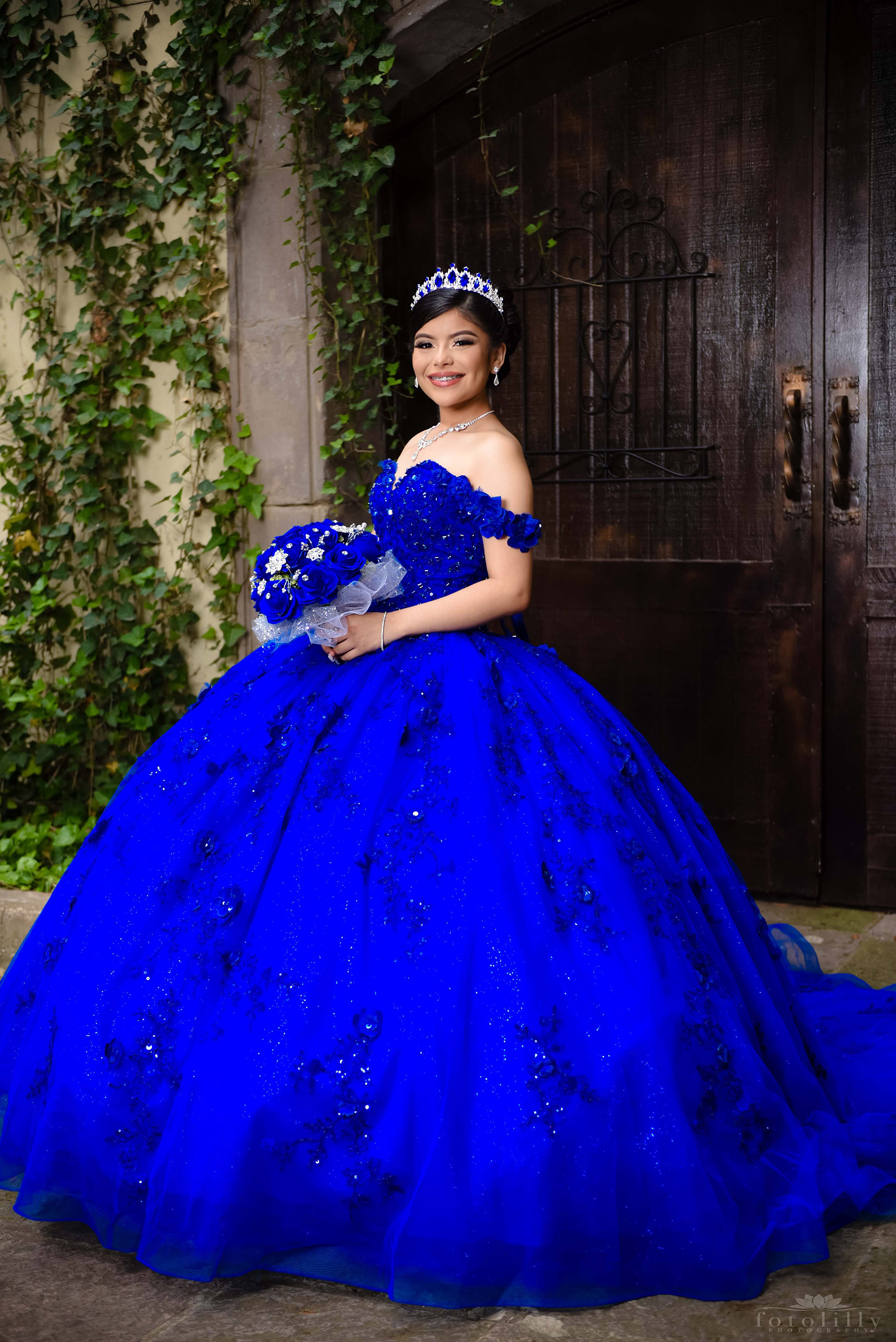 Quinceañera in a Stunning Blue Dress at a Photoshoot at the canals in Las Colinas