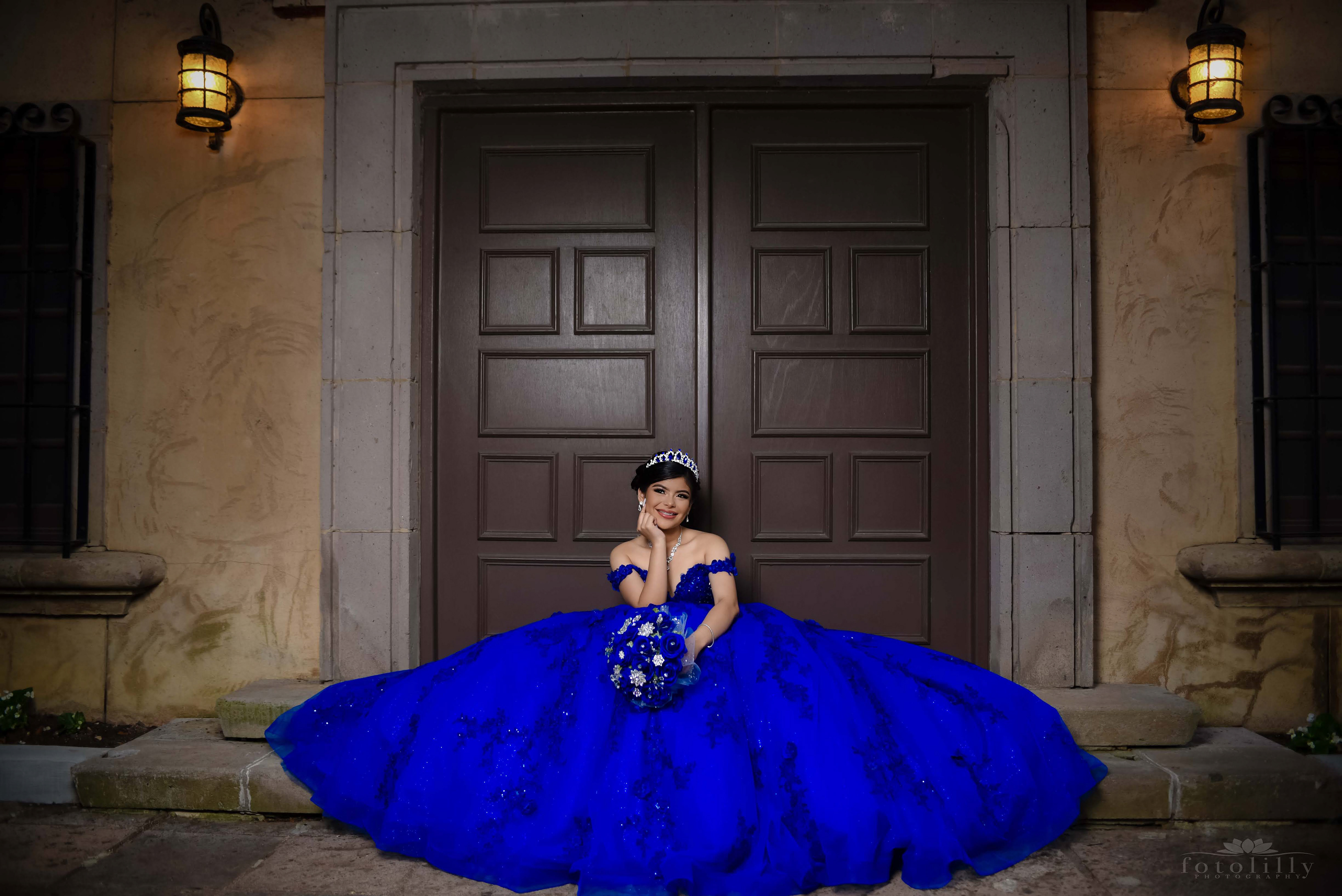 Quinceañera in a Stunning Blue Dress at a Photoshoot at the canals in Las Colinas