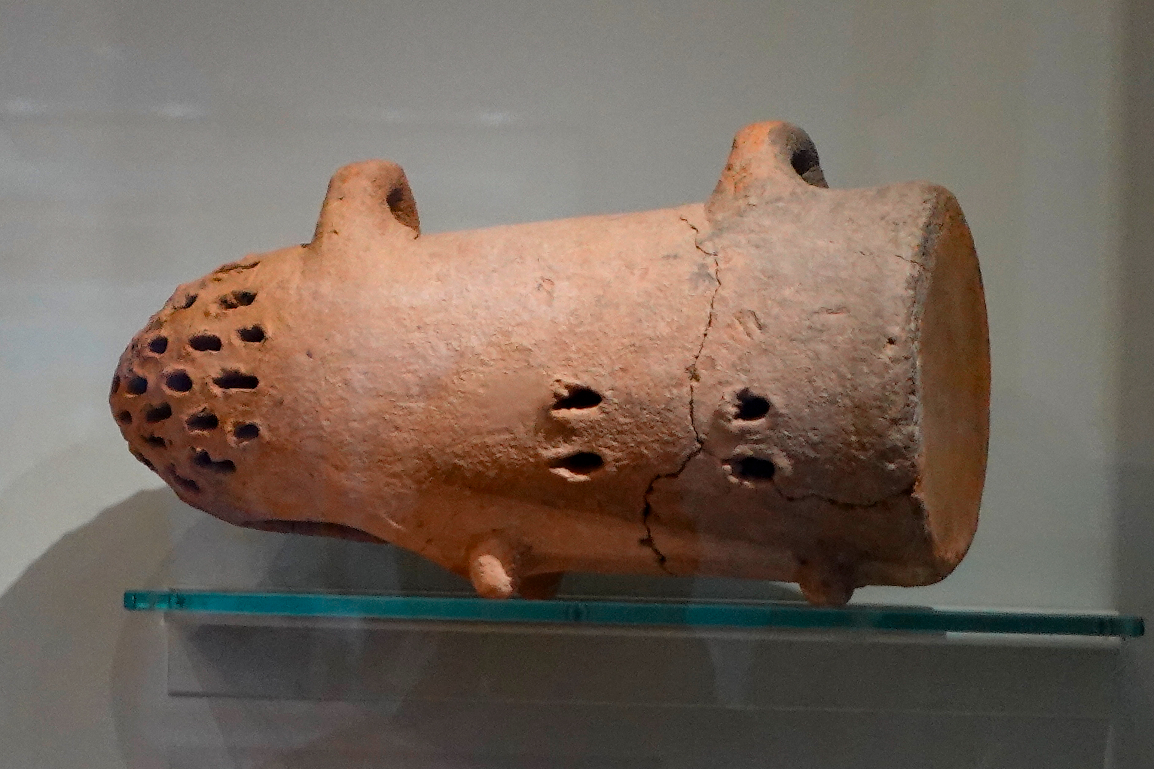 The Minoans loved honey and raised their own bees. This is a pottery bee smoker used when tending the hives.