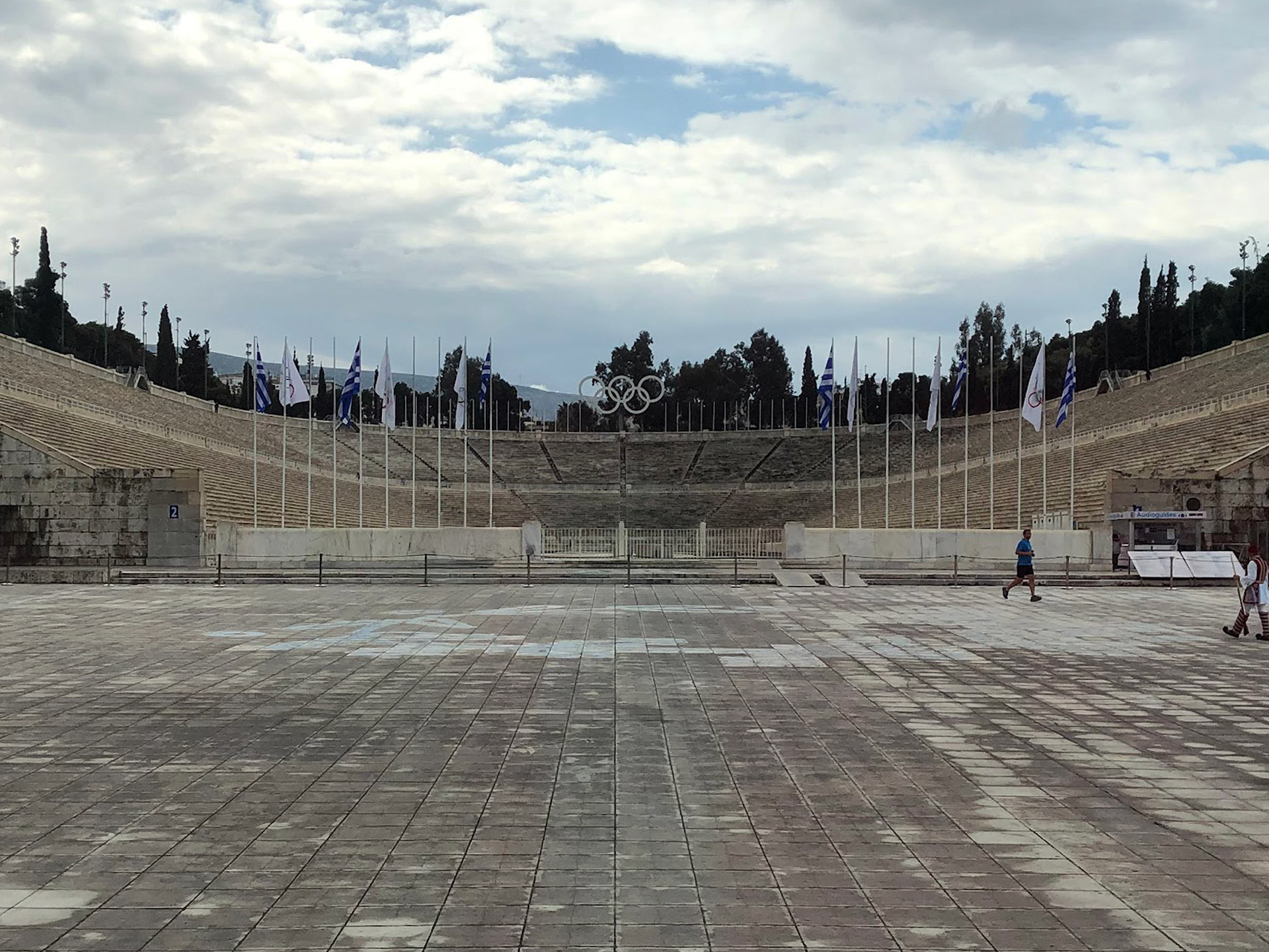 The Panathenaic Stadium in Athens seats 60,000. It is the starting point for the Olympic flame that is hand-carried by runners to the site of the Olympics every four years. 