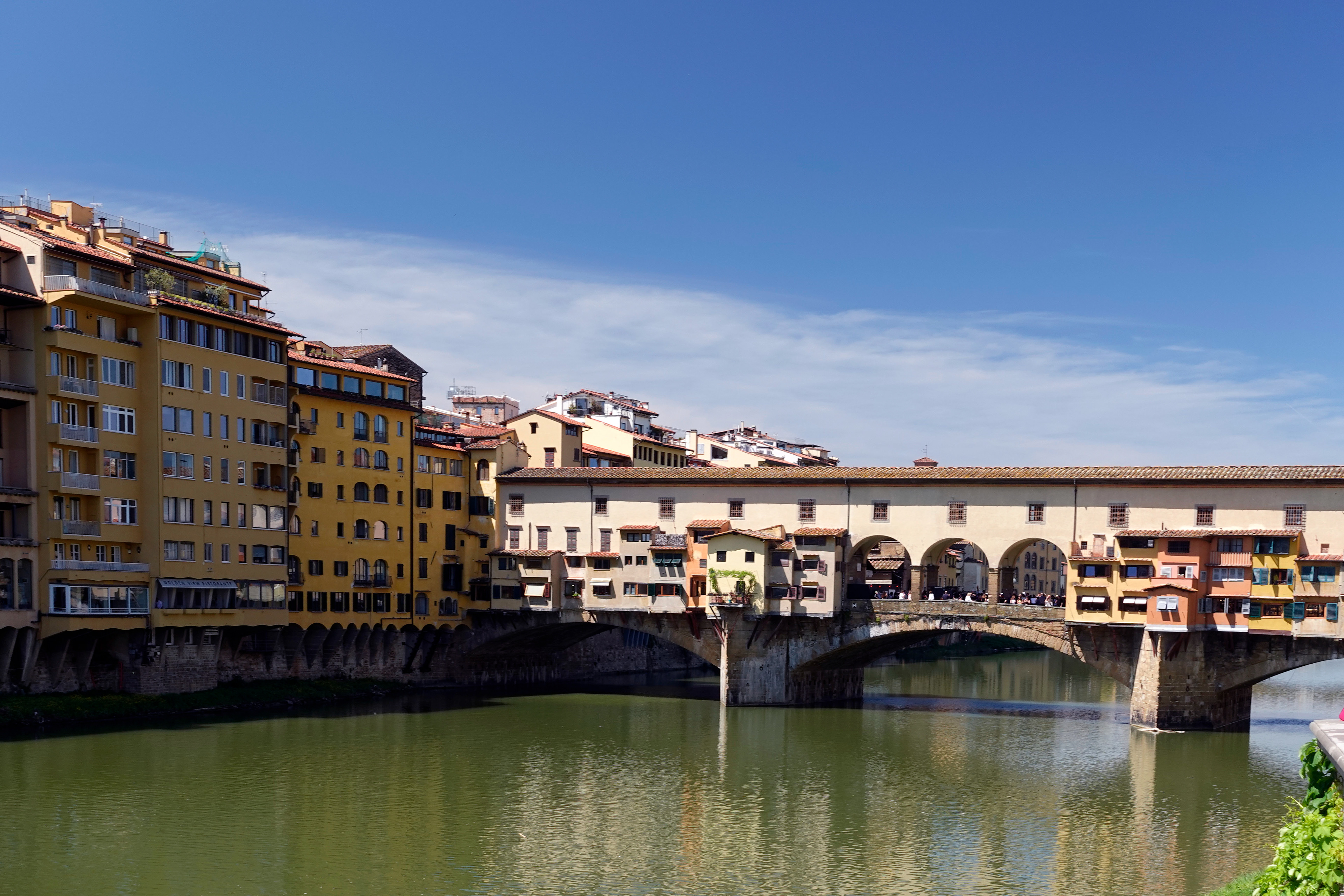 The Ponte Vecchio is the only bridge spared during World War II. It is now home to shops selling high-end jewelry and gold.