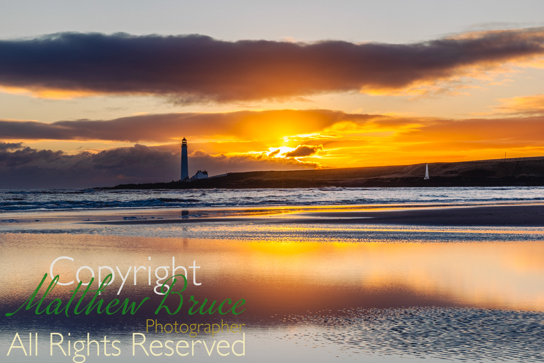 Dawn breaks behind Scurdy Ness lighthouse