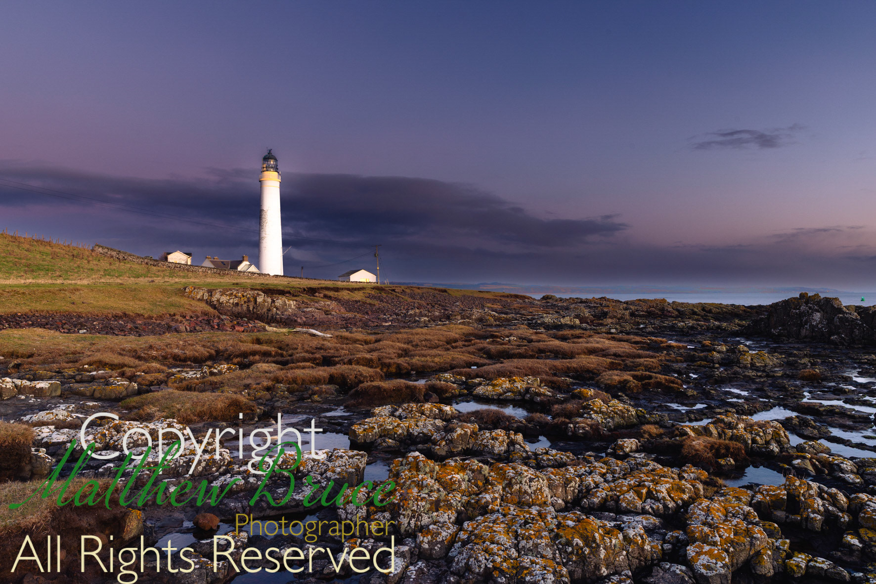Scurdy Ness lighthouse on the east coast of Scotland at dawn.