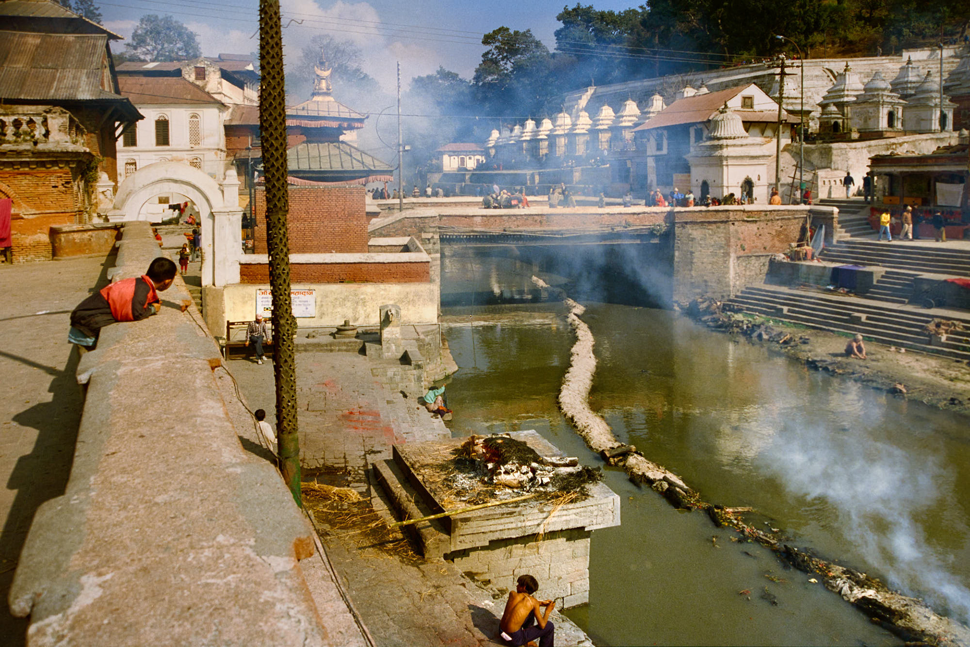 Nepal Pashupatinath Temple - The cremation of a dead body in this sacred Hindu Temple complex.