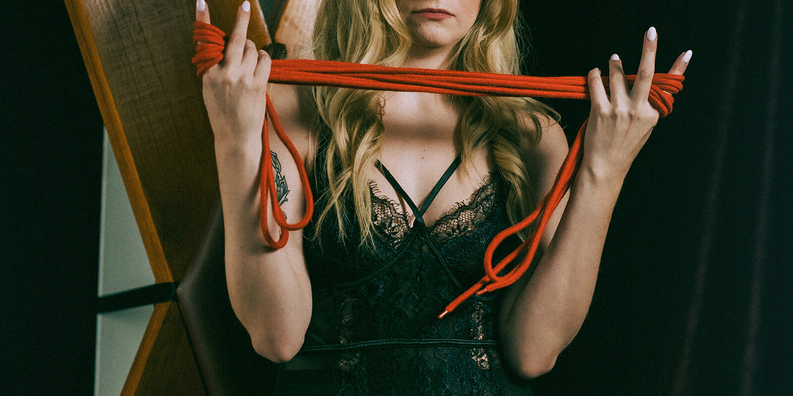Beautiful blonde professional dominatrix, Lady Meredith, prepares for medical play in her Dayton, Ohio BDSM dungeon.