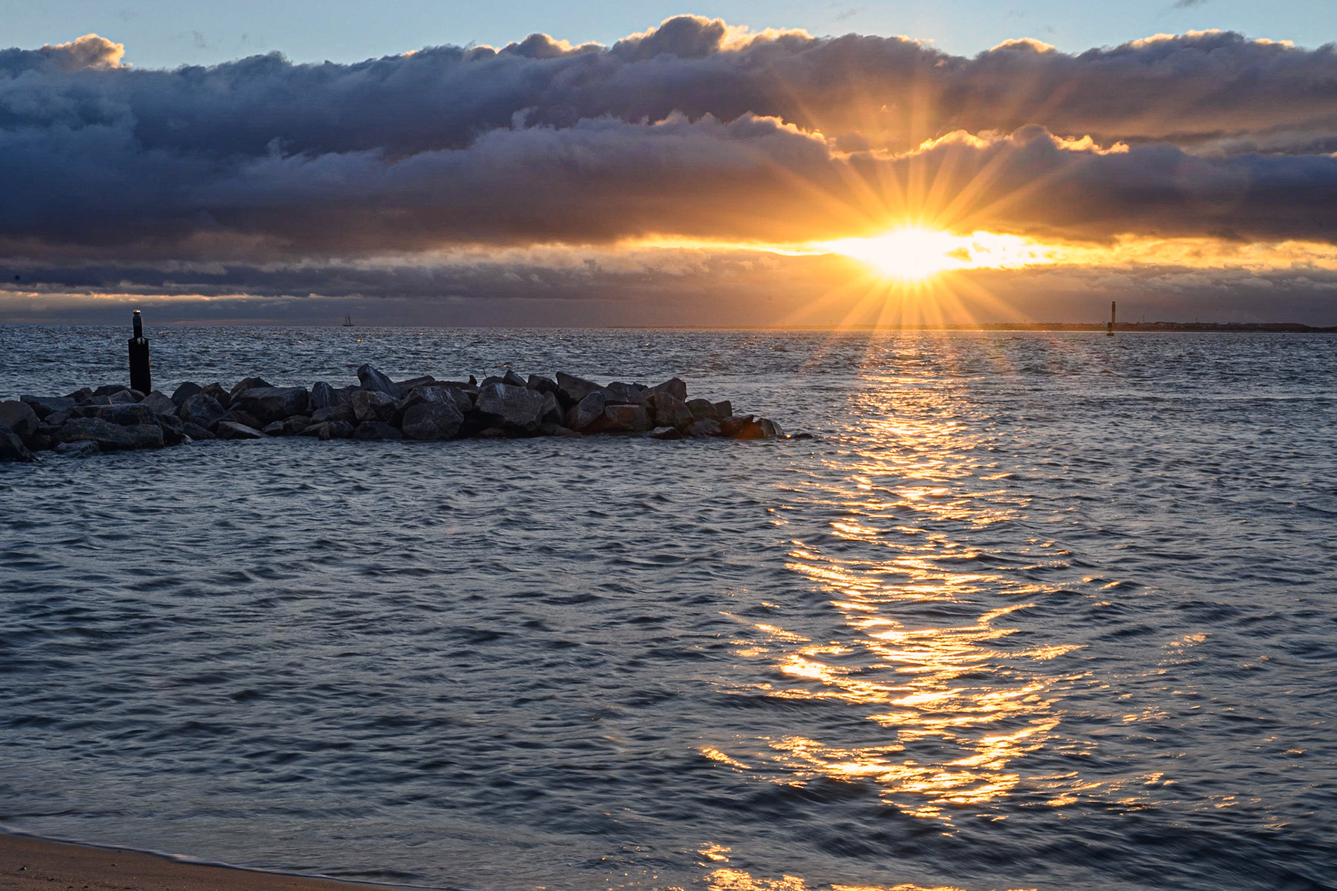 Sunset over the mouth of the Cape Fear River from Bald Head Island
