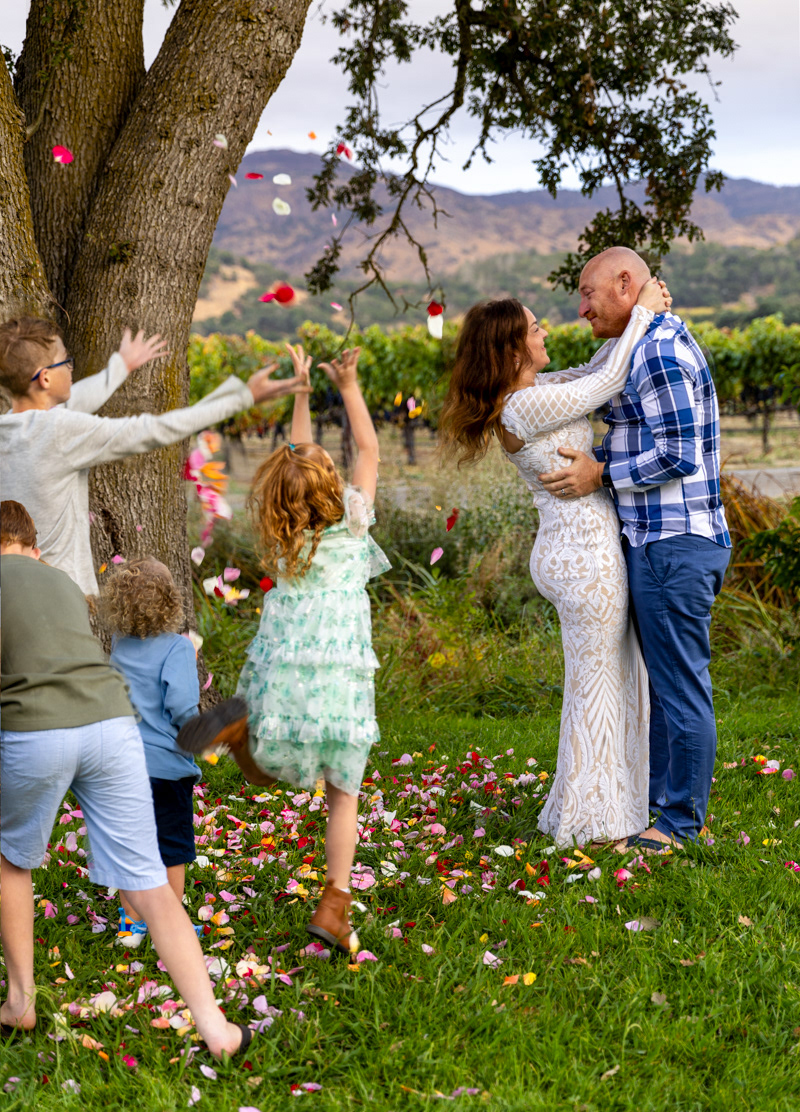 children-throwing-rose-petals-over-parents