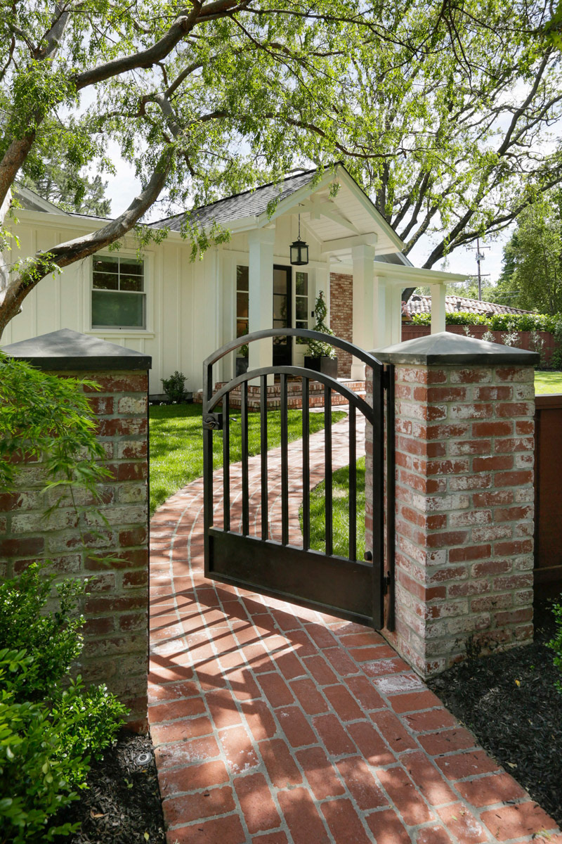 brick-walkway-with-open-front-gate