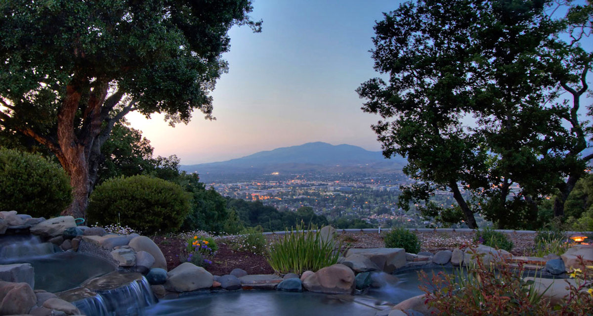 pool-with-waterfall-and-view-of-Mt-diablo-at-twilight
