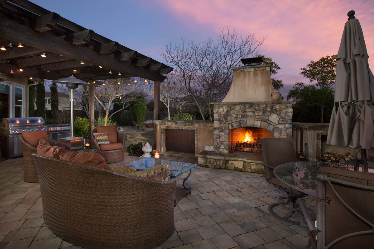 back-yard-outdoor-fireplace-at-twilight