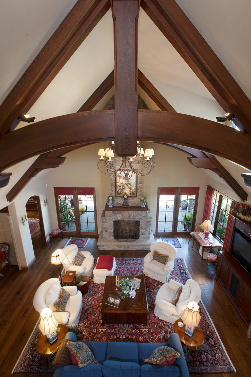 above-living-room-with-wood-beamed-arches