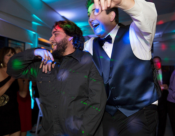 young men dancing at party