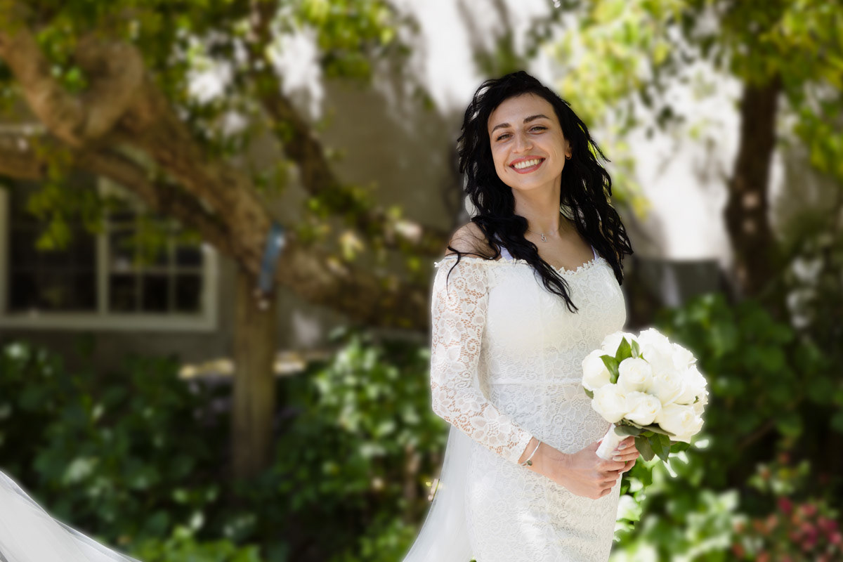 bride-with-flowing-black-hair-green-eyes-and-brilliant-smile