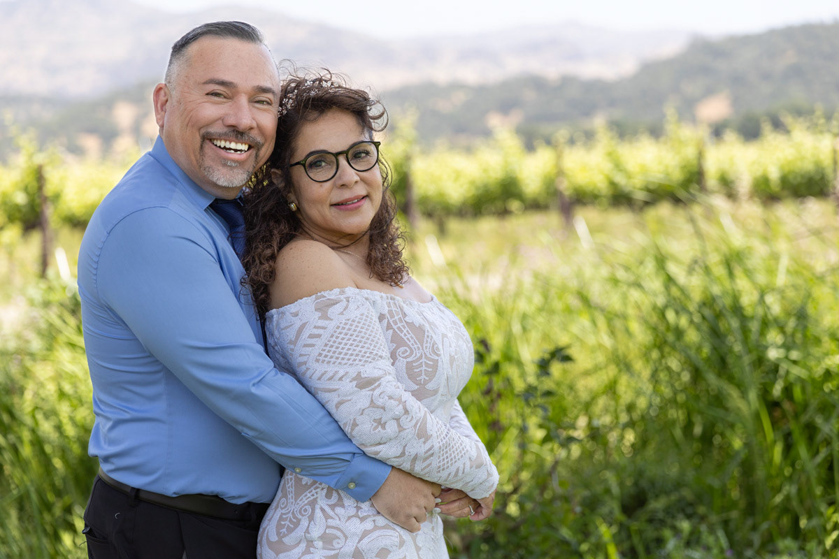 Couple-embrace-in-a-Yountville-vineyard
