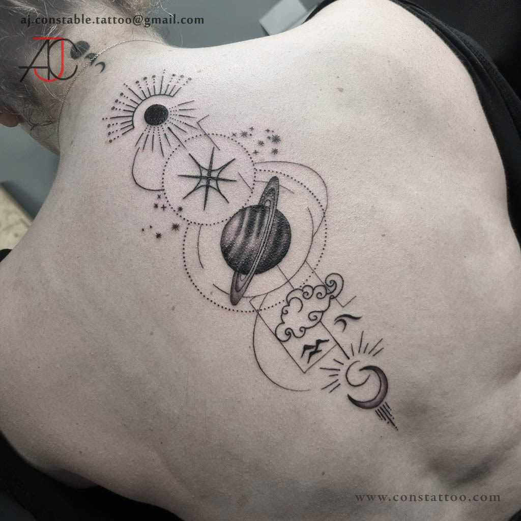 Space Themed Spine - AJ Constable Tattoo