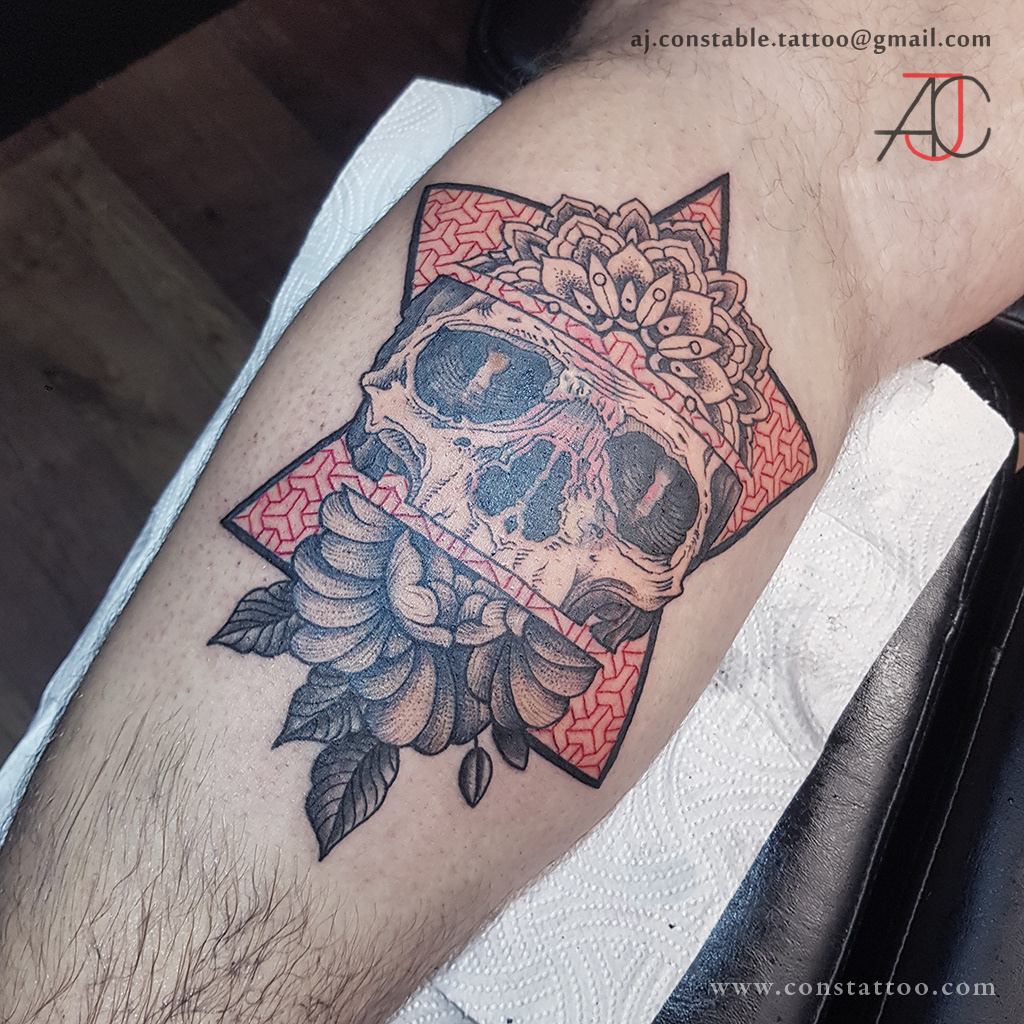 Colour geometric skull tattoo