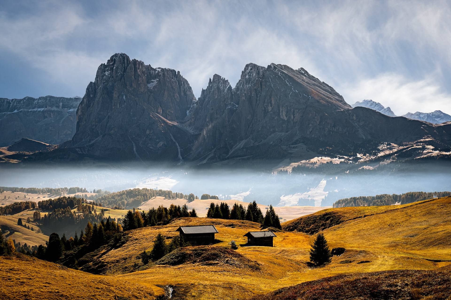 Morning haze Alpe di Siusi in Dolomites