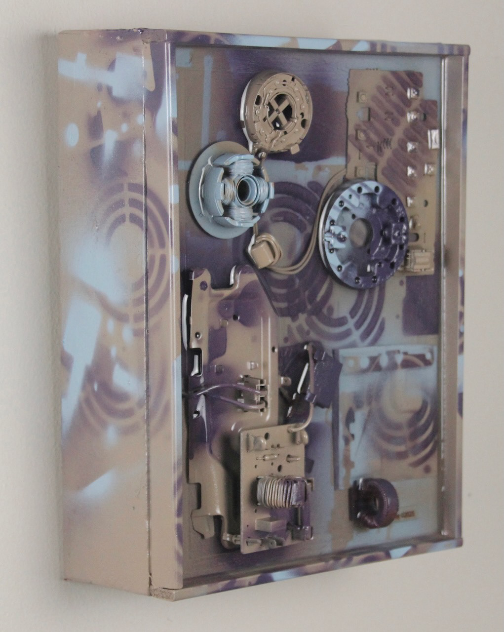 Times and Seasons; SOLD (H:12” x W:9” x D:5”) Assorted machine and computer parts, license plate section, spray paint, epoxy resin, canvas covered wood frame