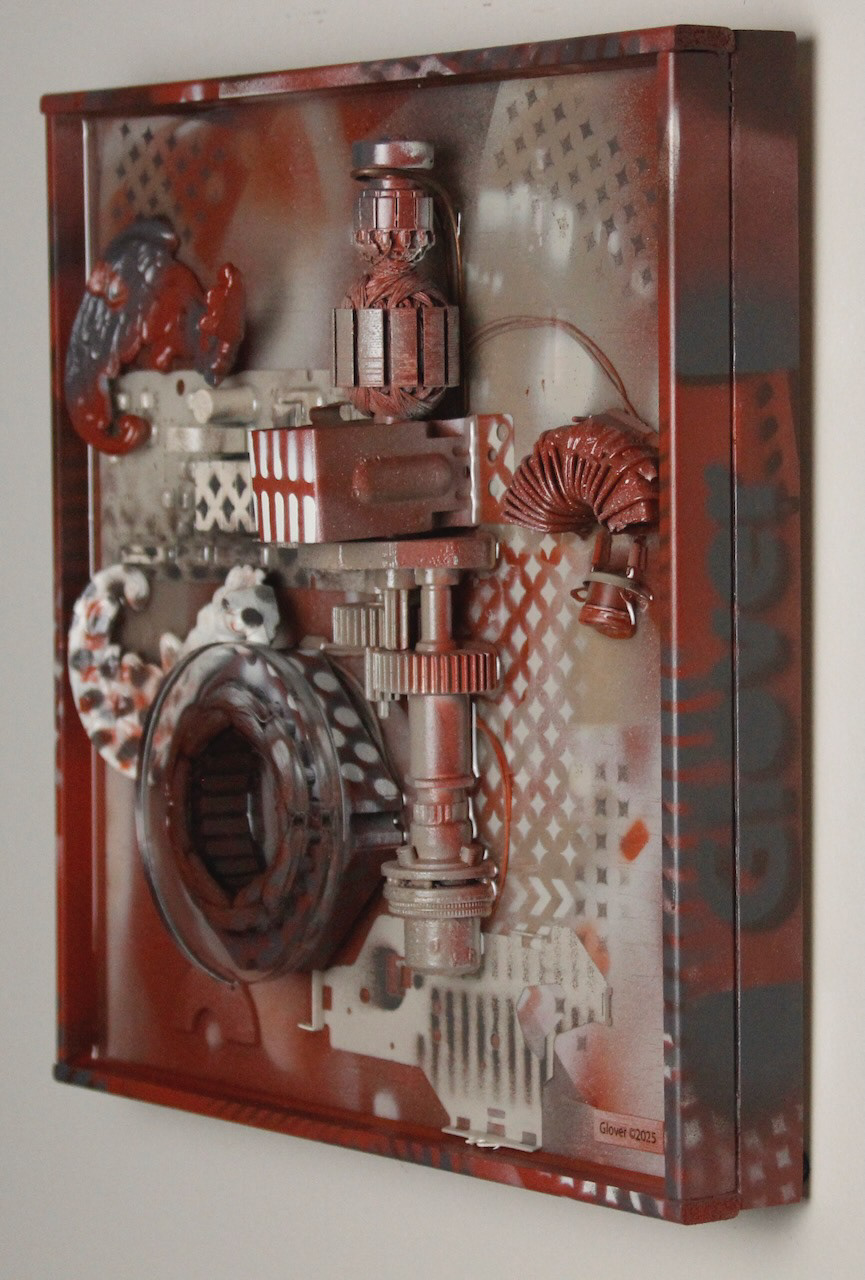 It spreads its wings to catch them and carries them off.; $990 (H:12” x W:12” x D:3.5”) Decorative lamp parts, machine parts, computer circuits, hand drill innards, spray paint, epoxy resin, wood base