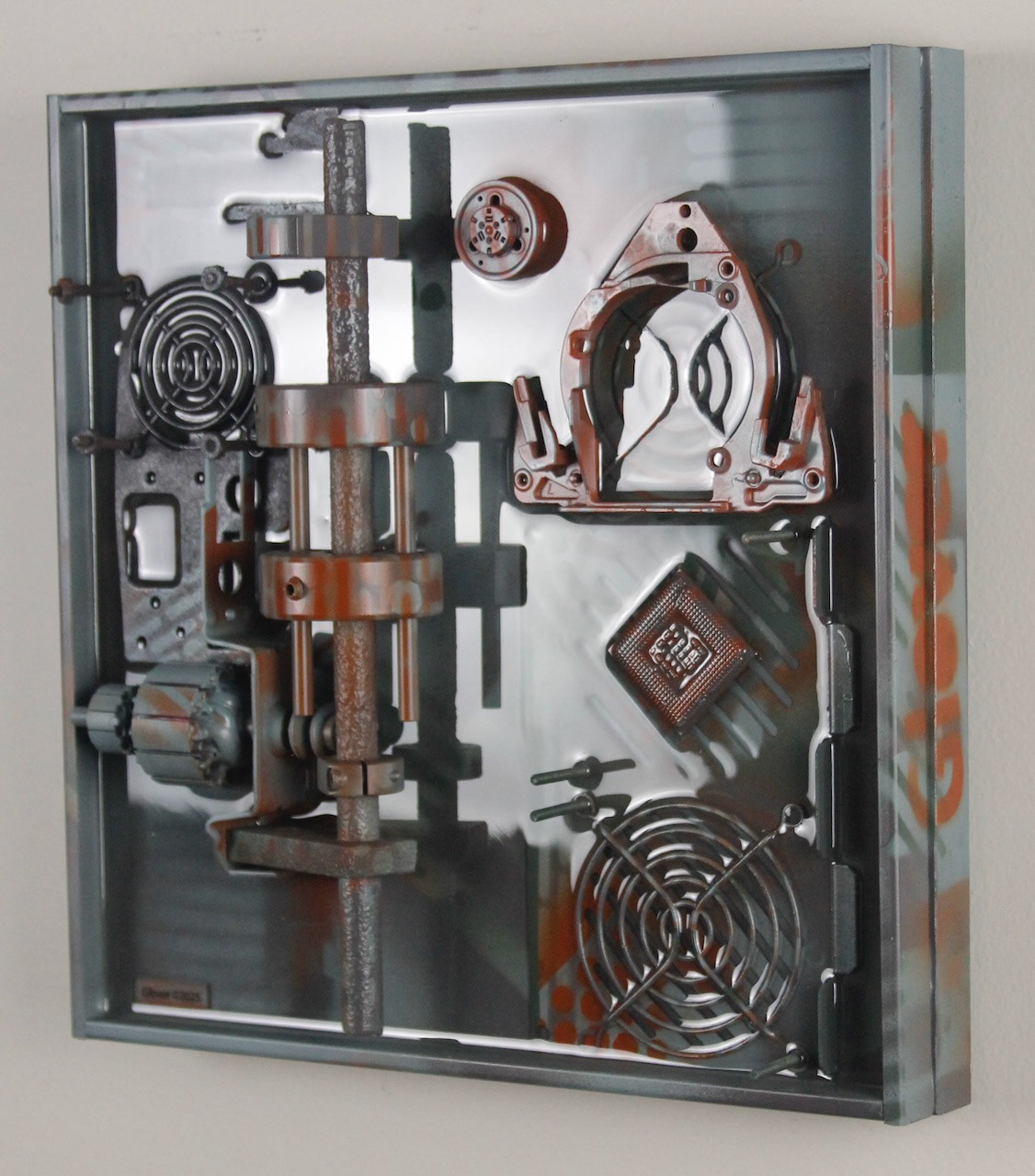 Omega Three; SOLD (H:12” x W:12” x D:3.25”) Assorted machine and computer parts, spray paint, epoxy resin, wood base