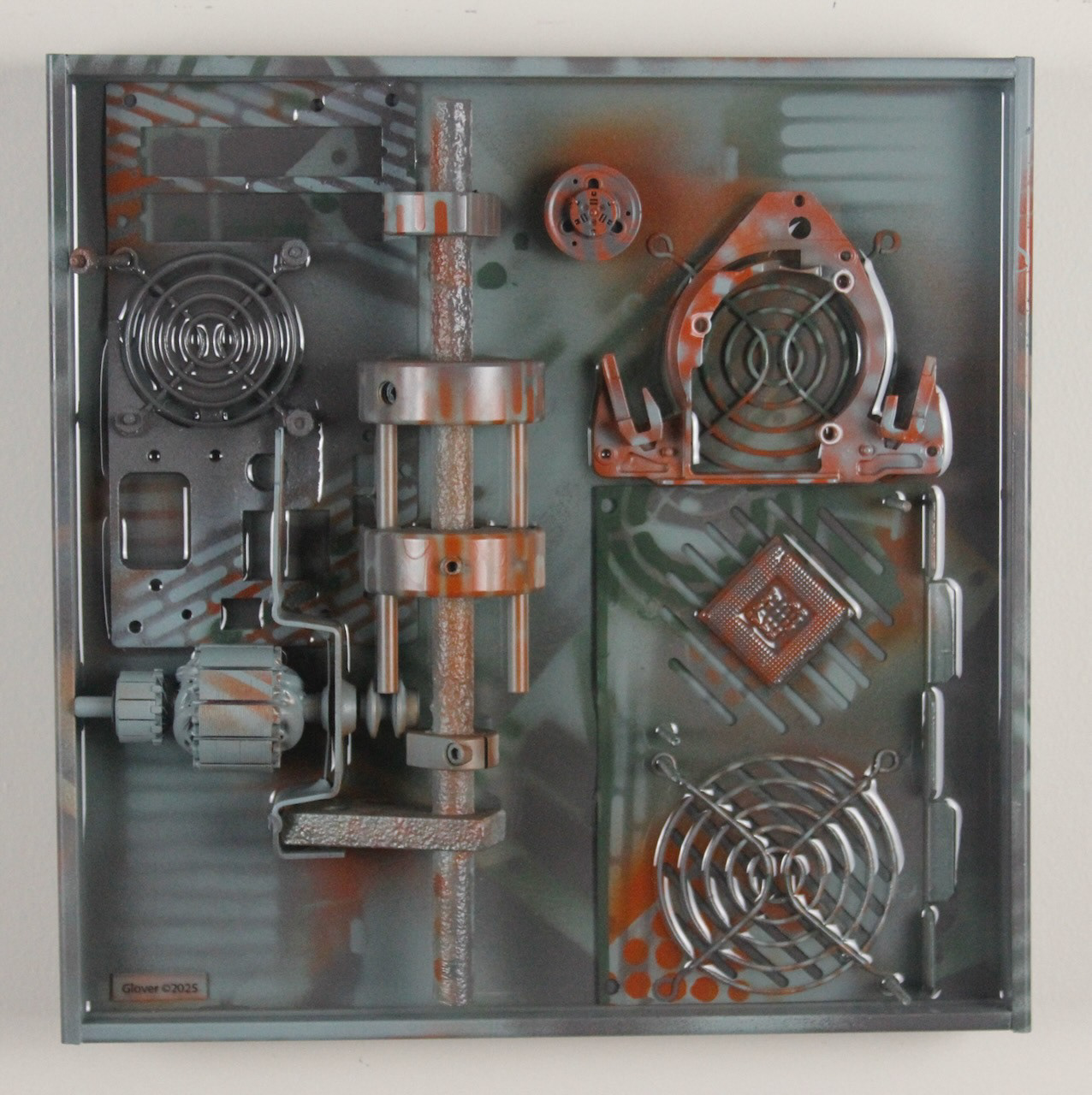 Omega Three; SOLD (H:12” x W:12” x D:3.25”) Assorted machine and computer parts, spray paint, epoxy resin, wood base