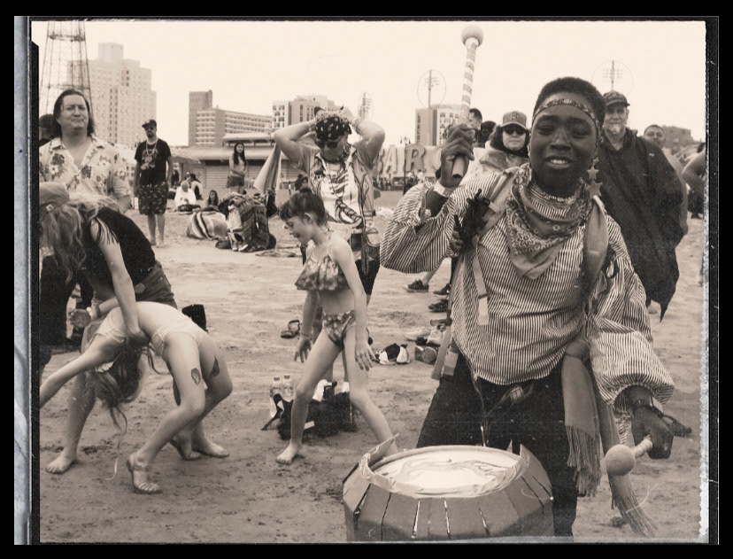 “Community Scape 2: Strangers vibing to the beat of the same drum." - Haley Watson, 2024