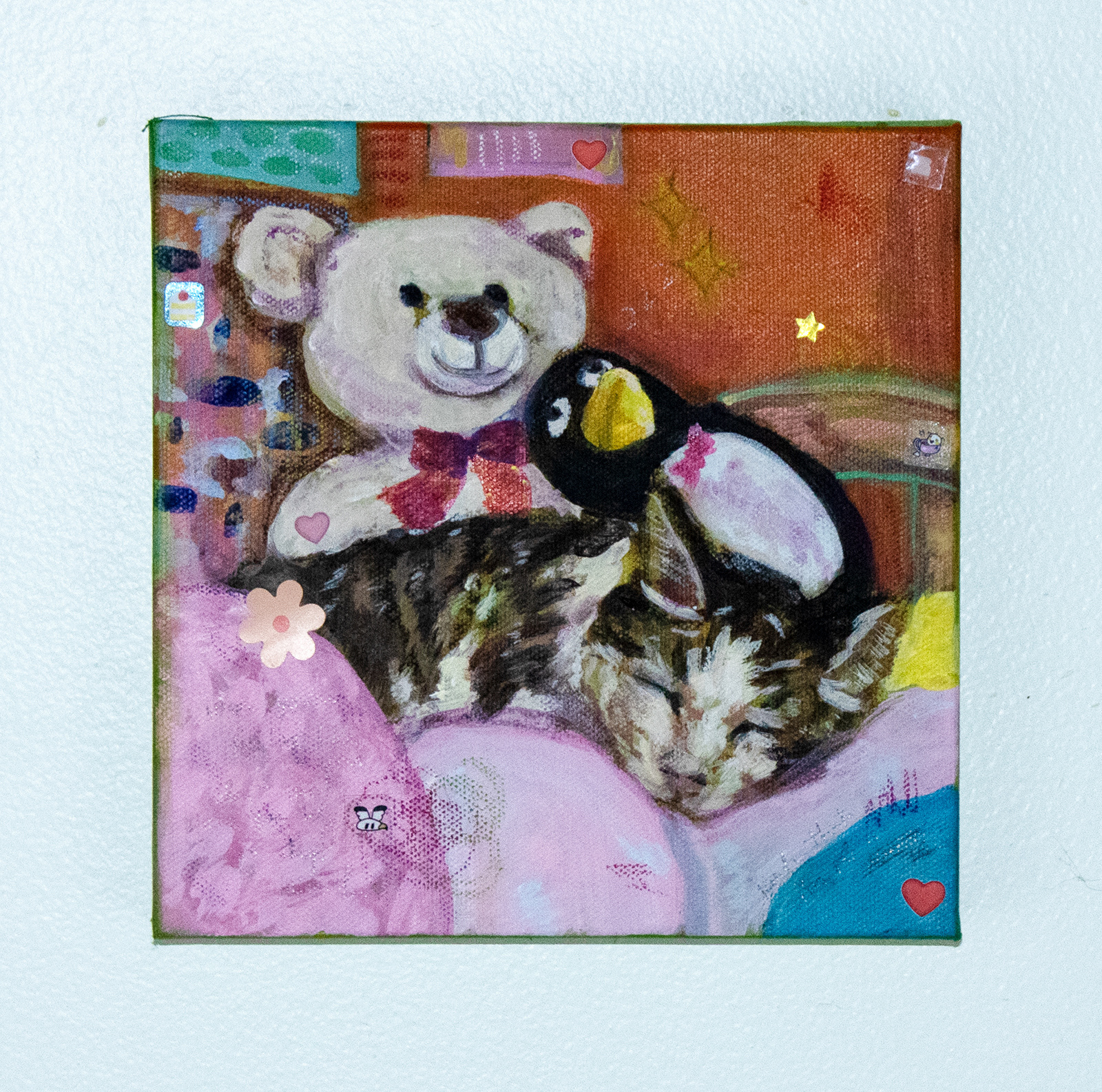 "why can't I just be a cat? (Charlie)," acrylic, oil pastel, and stickers on canvas, 8”x8,” 2021.