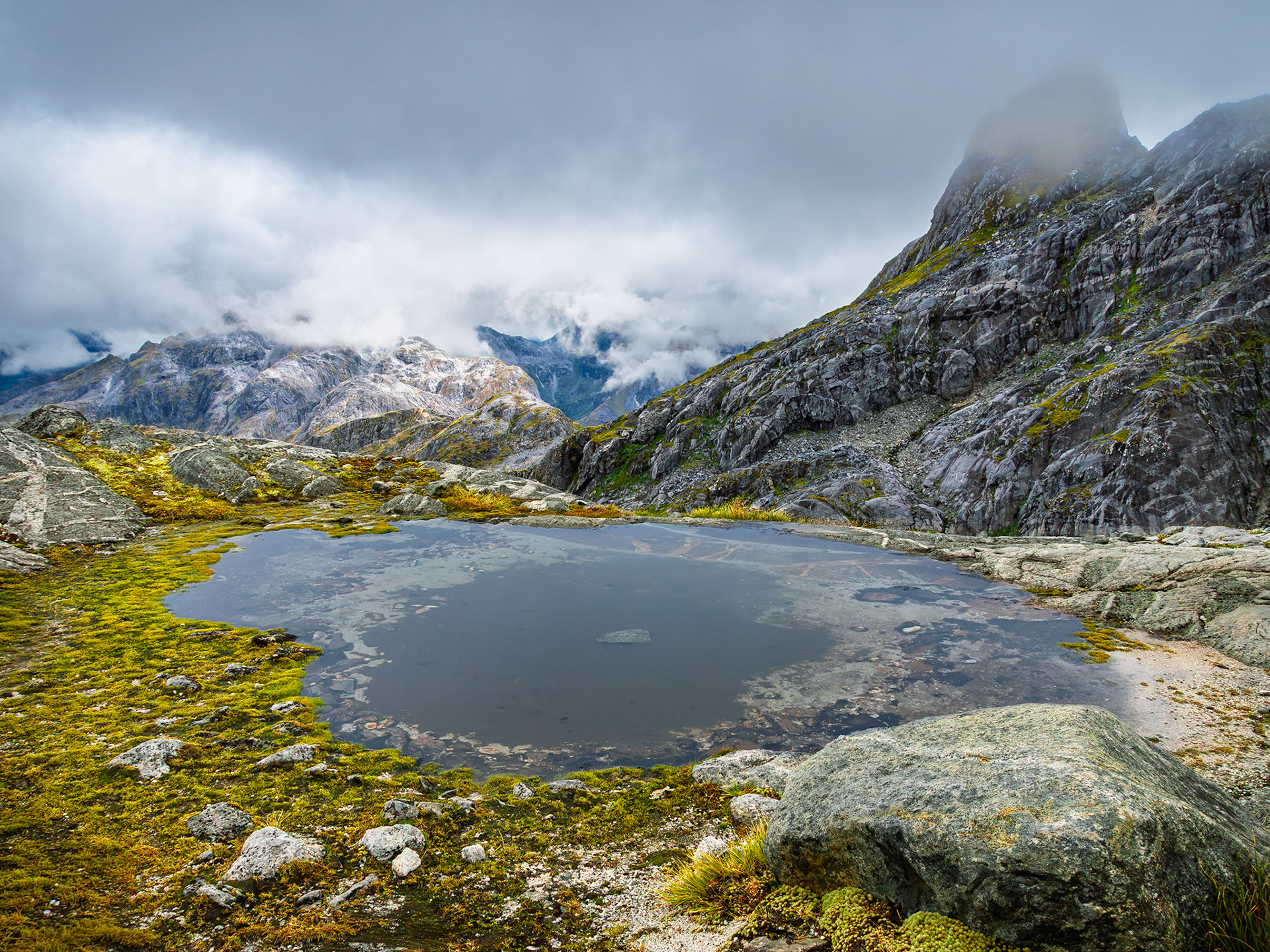 Color and light emerge briefly amid dramatic weather.