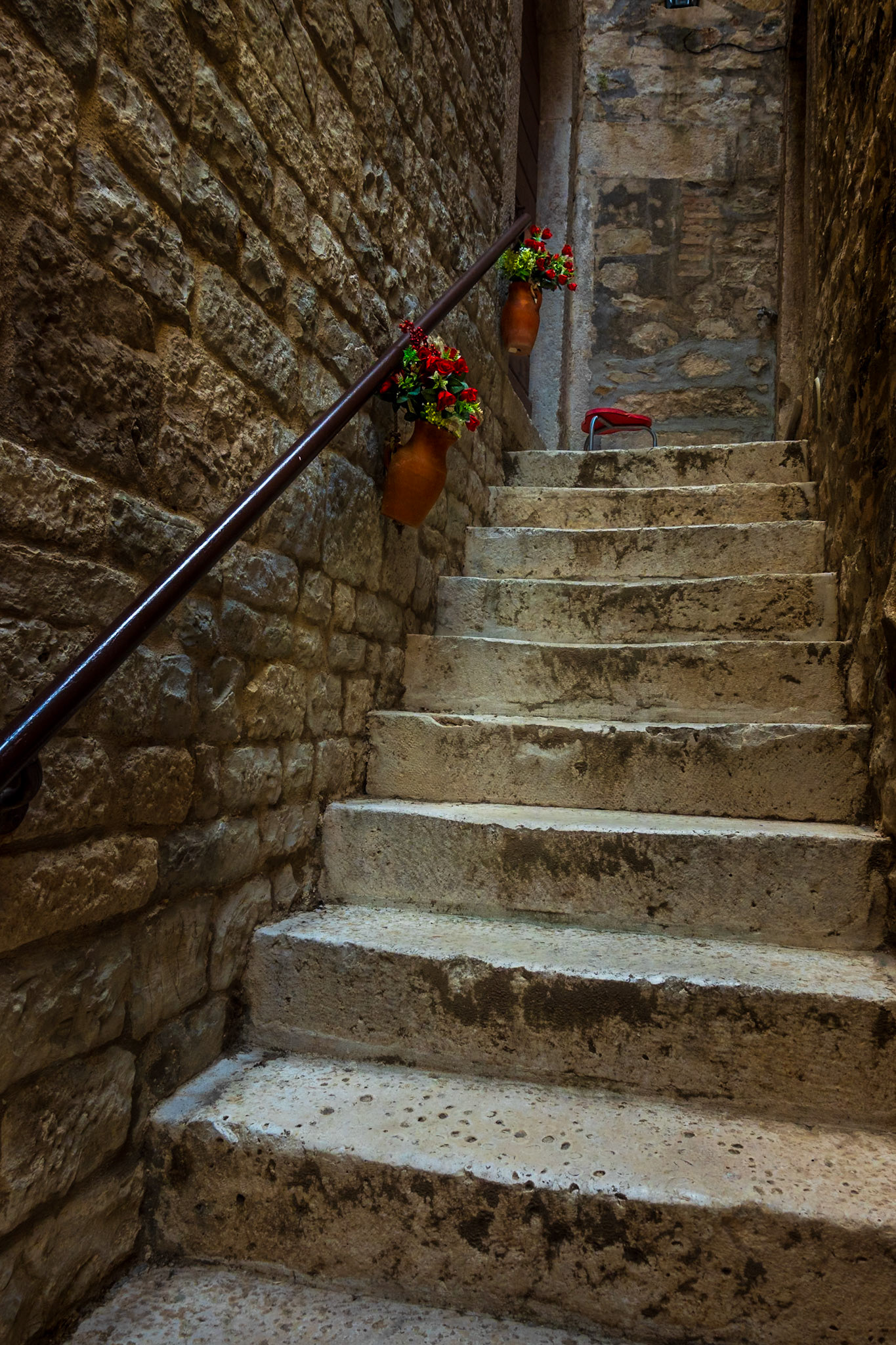 Each step a worn memory.