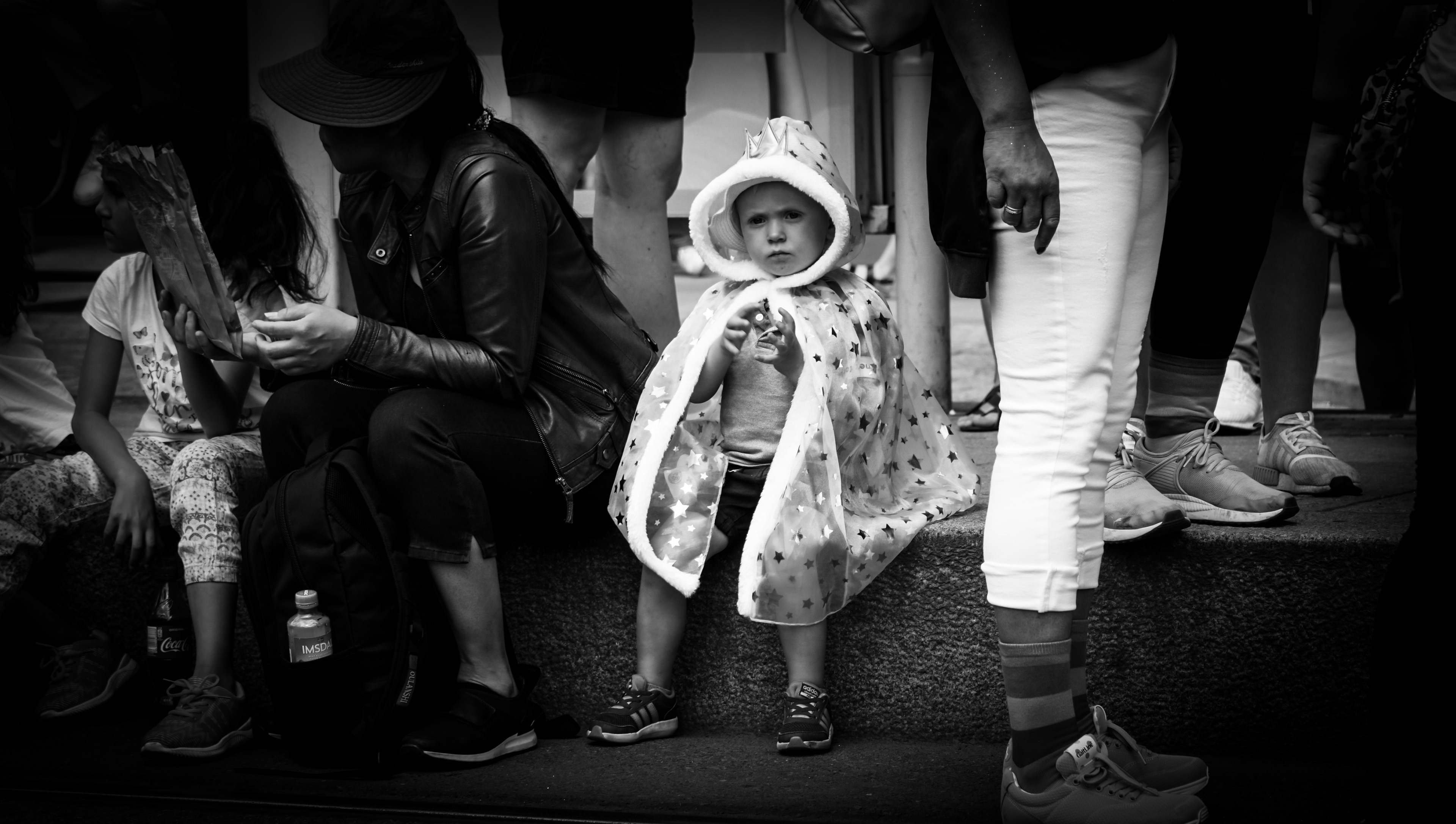 Kid attending the 2018 Oslo Pride in Norway. Black and white documentary photography