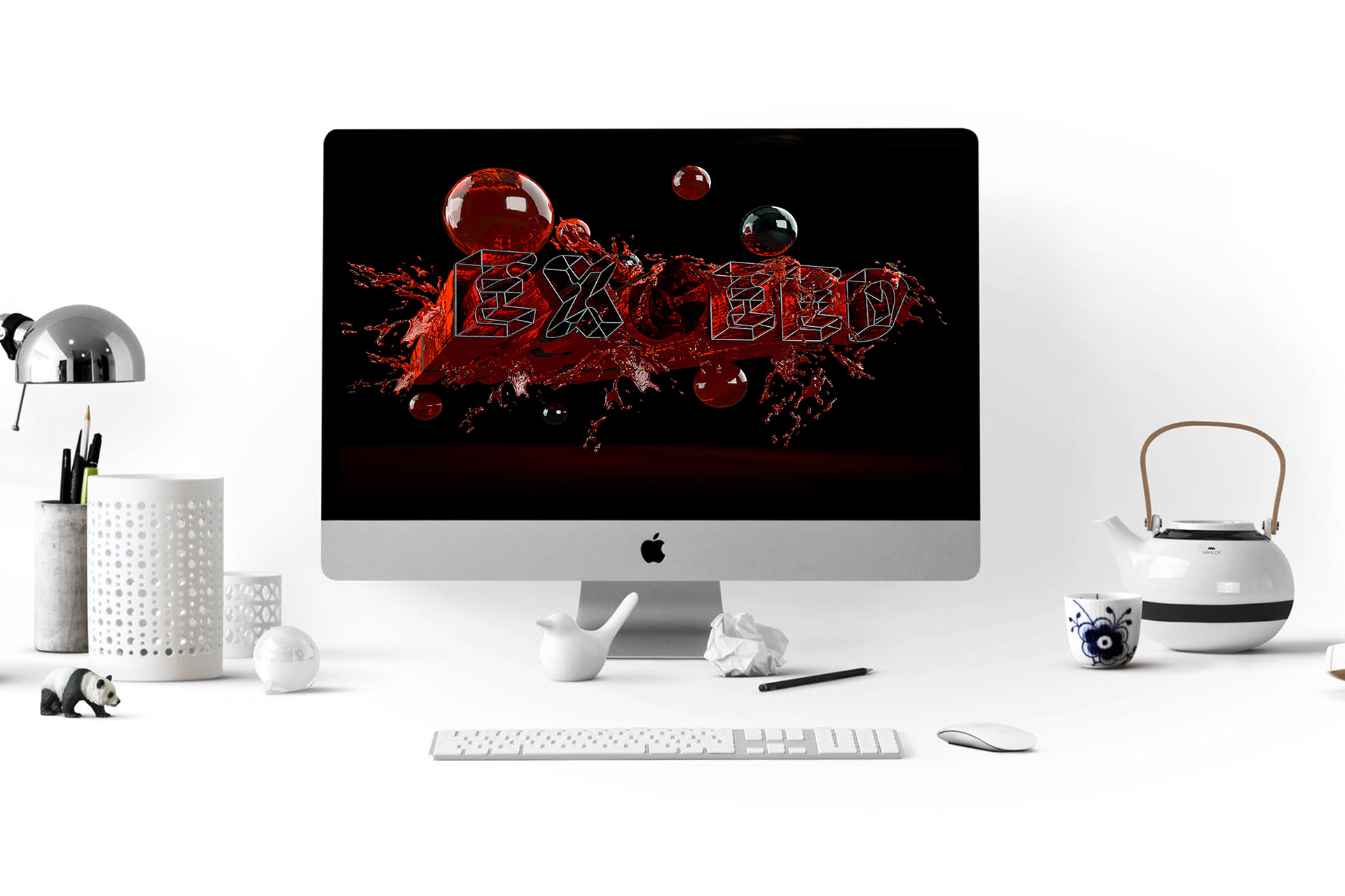 Mac screen with a 3D typography design created with adobe dimension