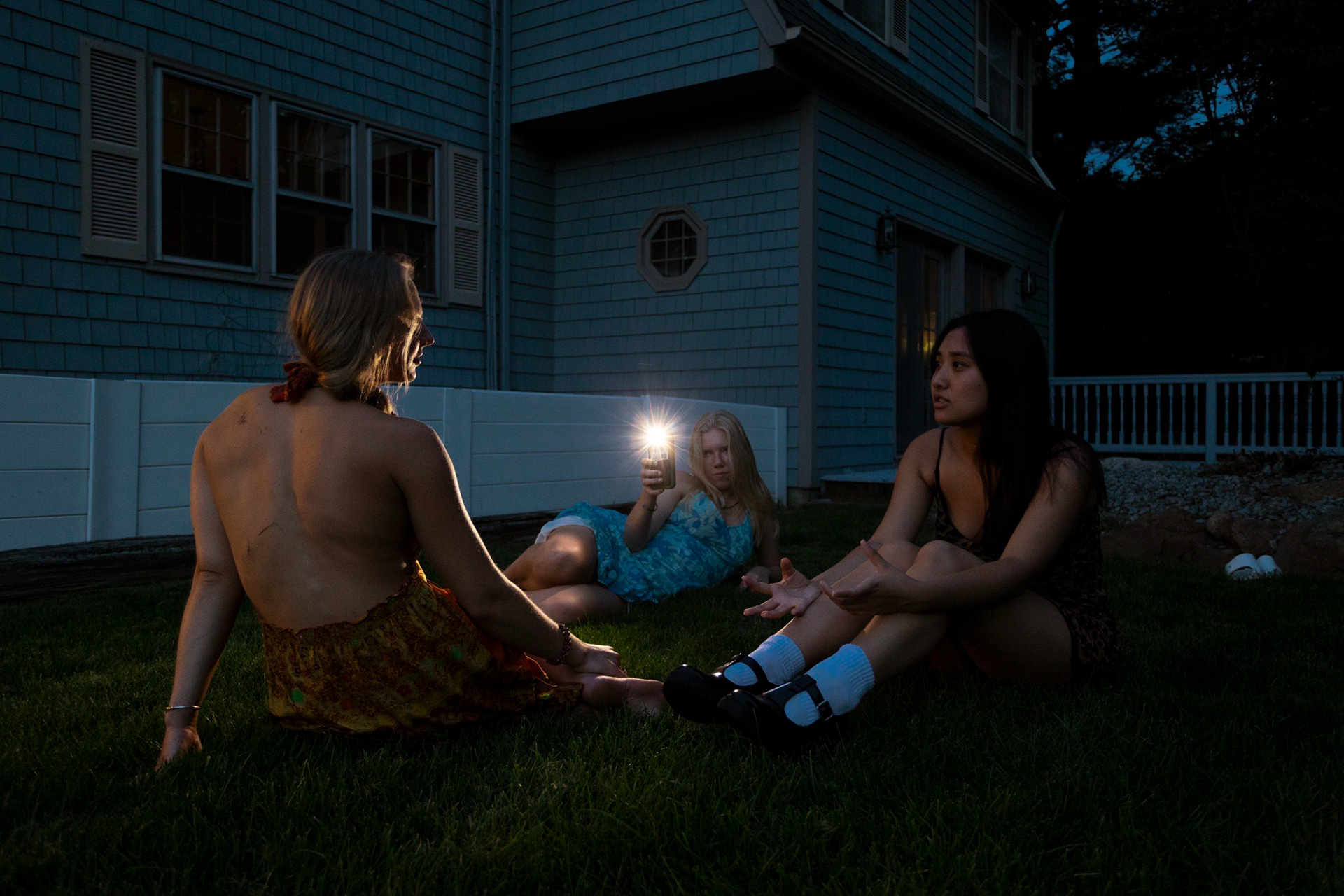 Hanna snaps photo of Hyla while Stef tells a story