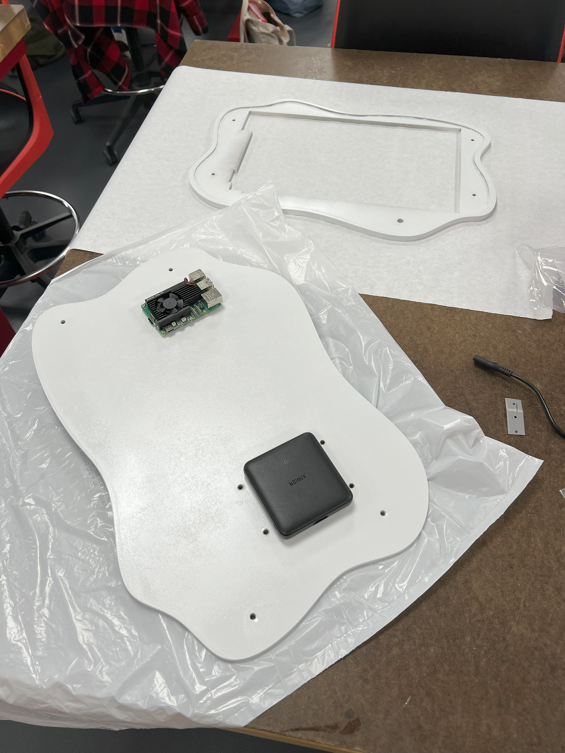 After completing laser cutting and spray painting the face of the device, I began mounting the hardware.