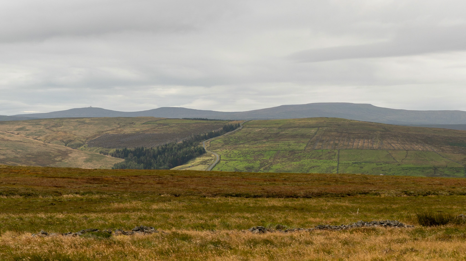 Looking west, left to right, Great Dun Fell radar station, Little Dun Fell, Cross Fell, which is the highest point in England outside the Lake District.