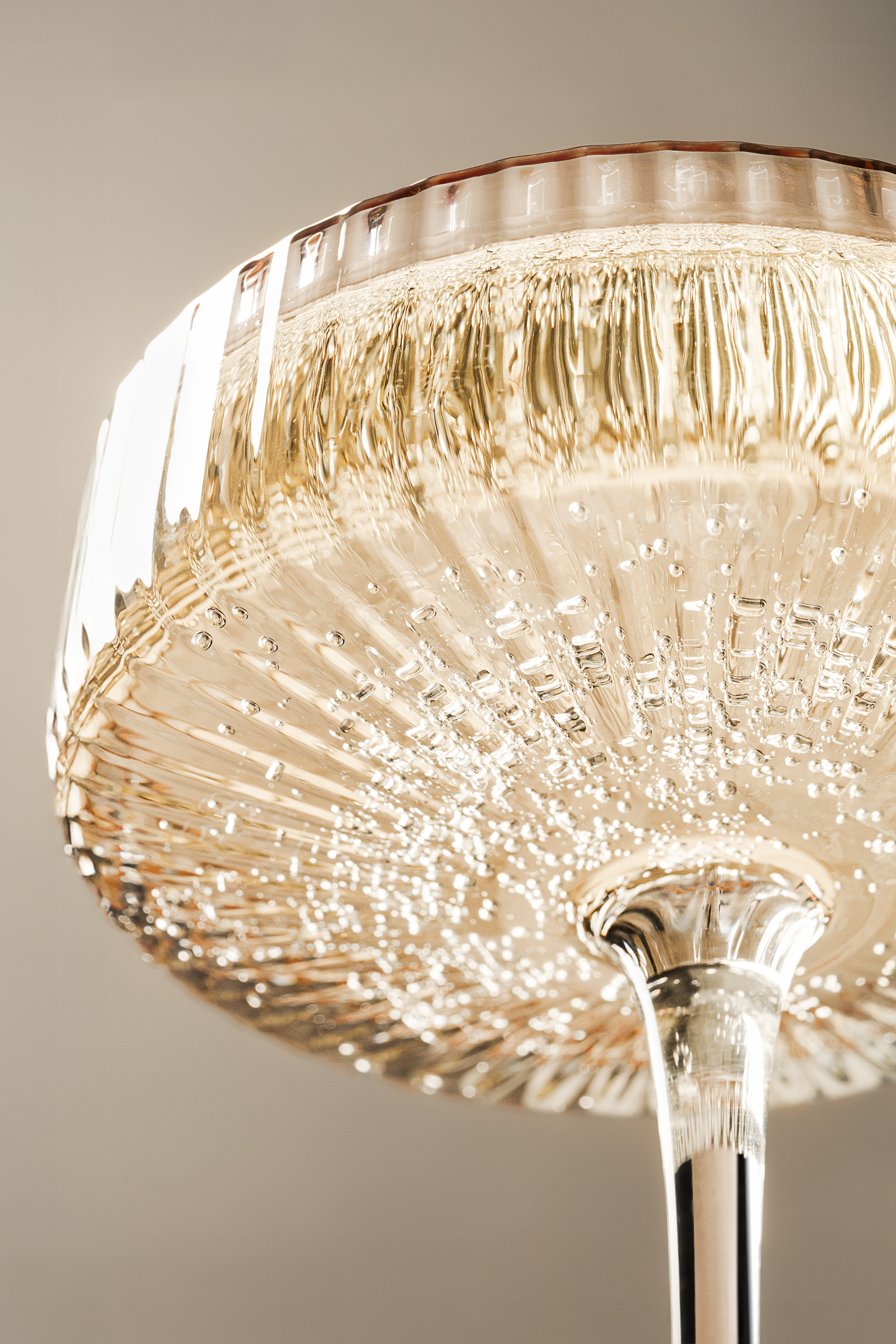 Premium champagne glass photography for alcohol brand and beverage marketing