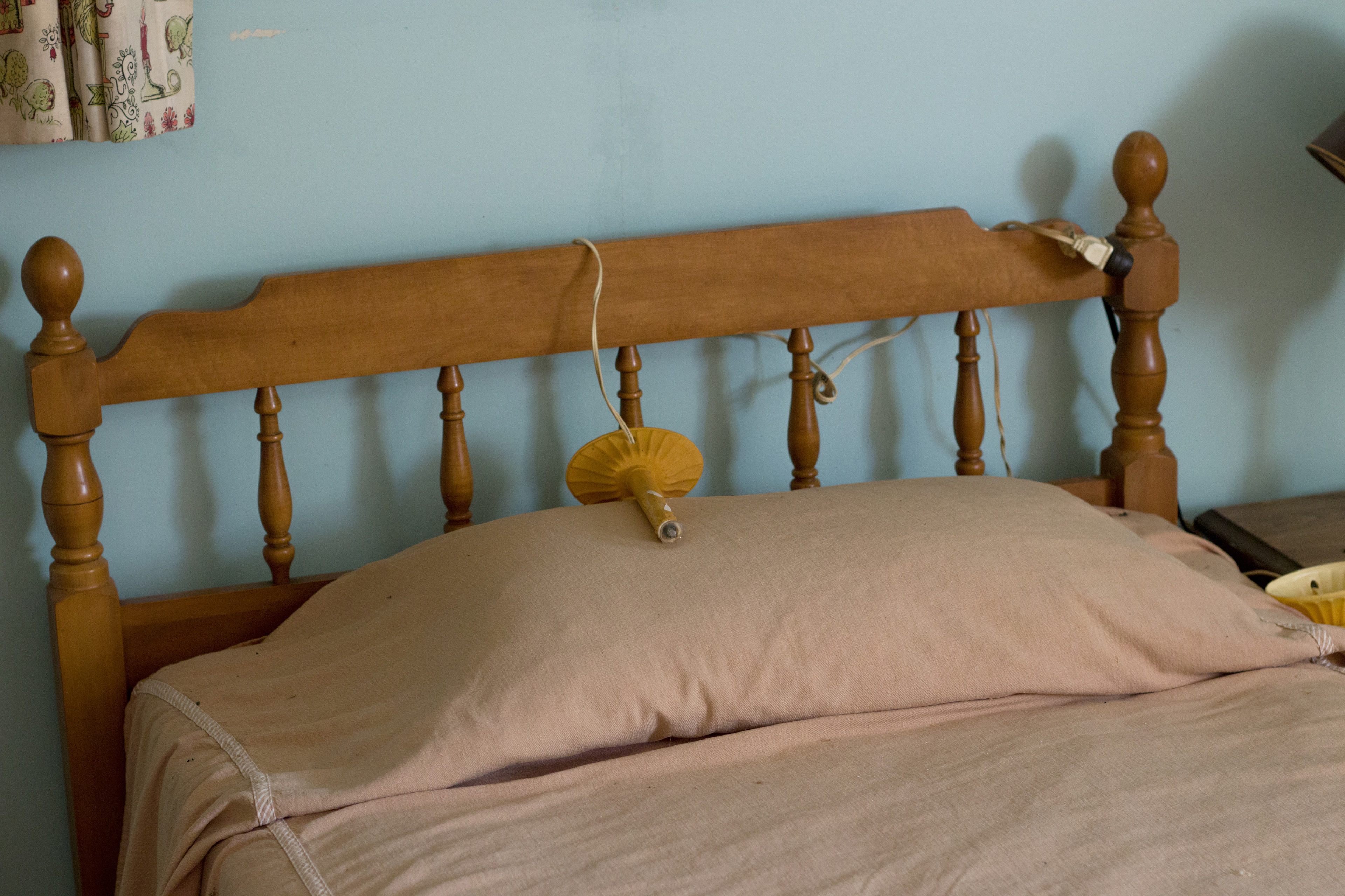 Candle Fallen on Bed