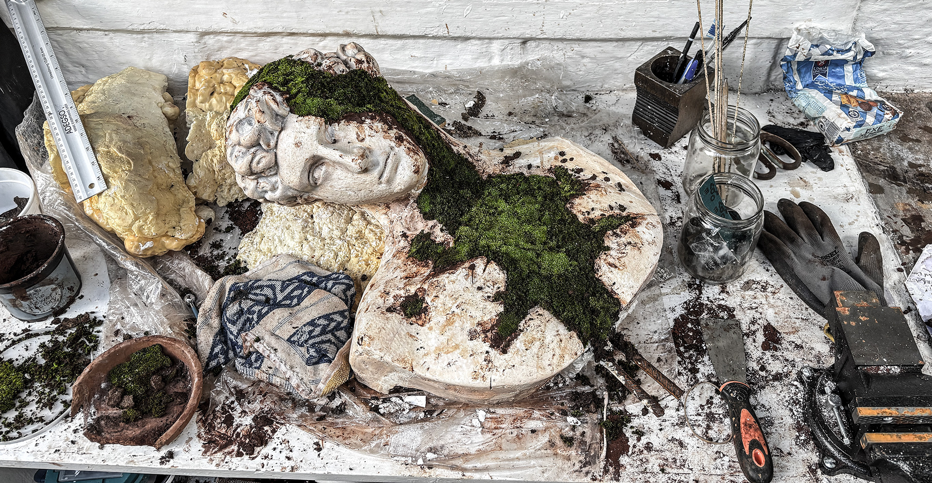 Intentional Deconstruction of a Realistic Bust Sculpture, embracing the Wabi-Sabi philosophy to reveal beauty in the weathered and the worn.