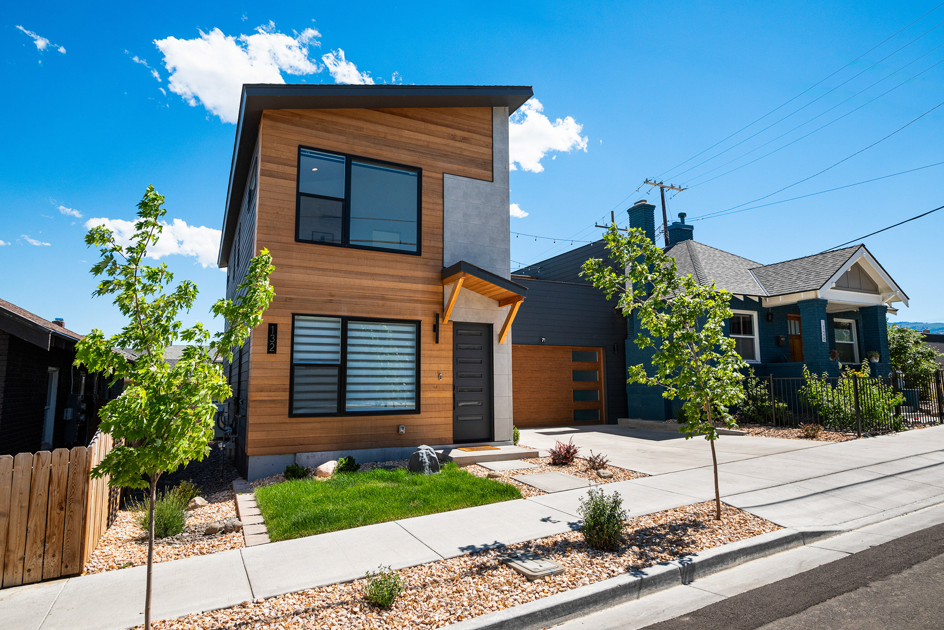 Architectural detail photography showing sleek modern entry facade and lighting fixtures in Wildomar residential listing